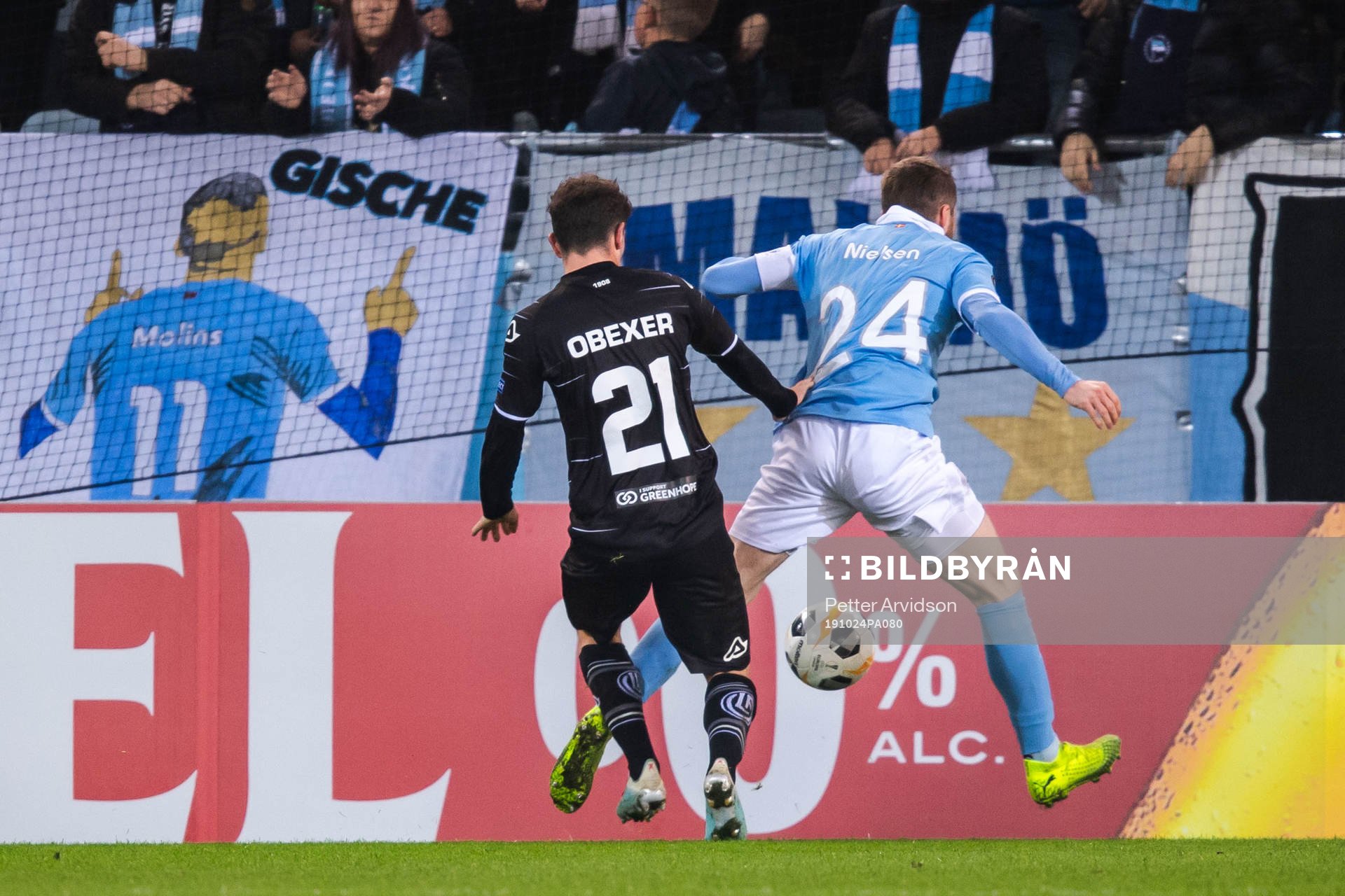 Lasse Nielsen of Malmö FF and Linus Obexer of Lugano