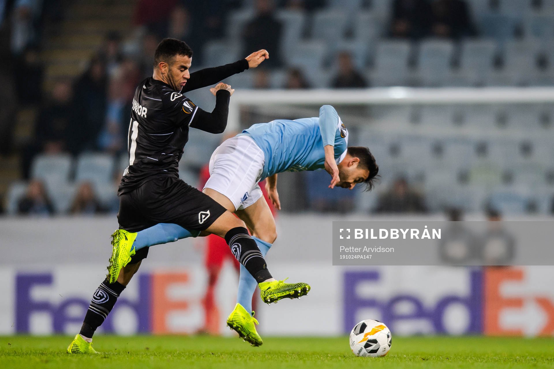 Behrang Safari of Malmö FF and Carlinhos Junior of Lugano