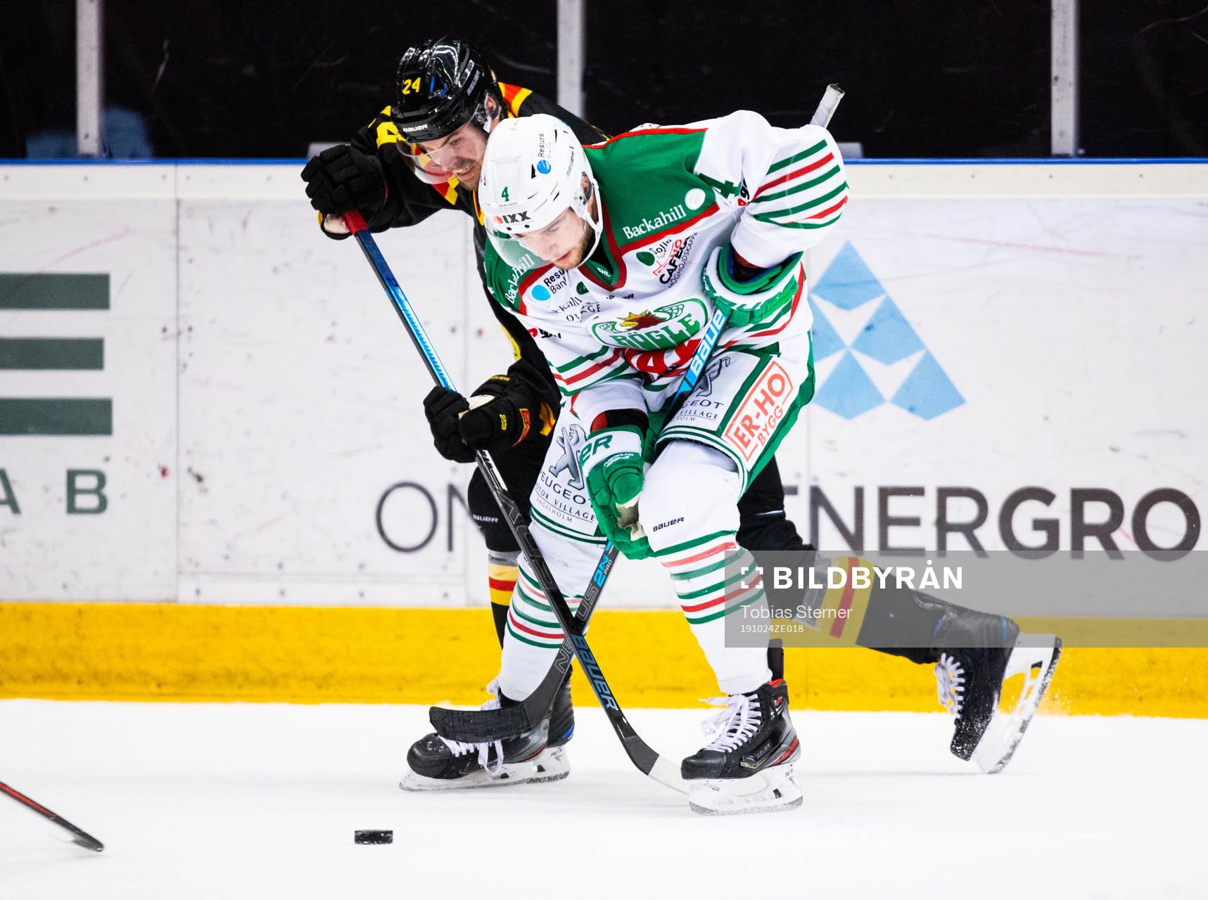 Brynäs Emil Molin och Rögles Kodie Curran