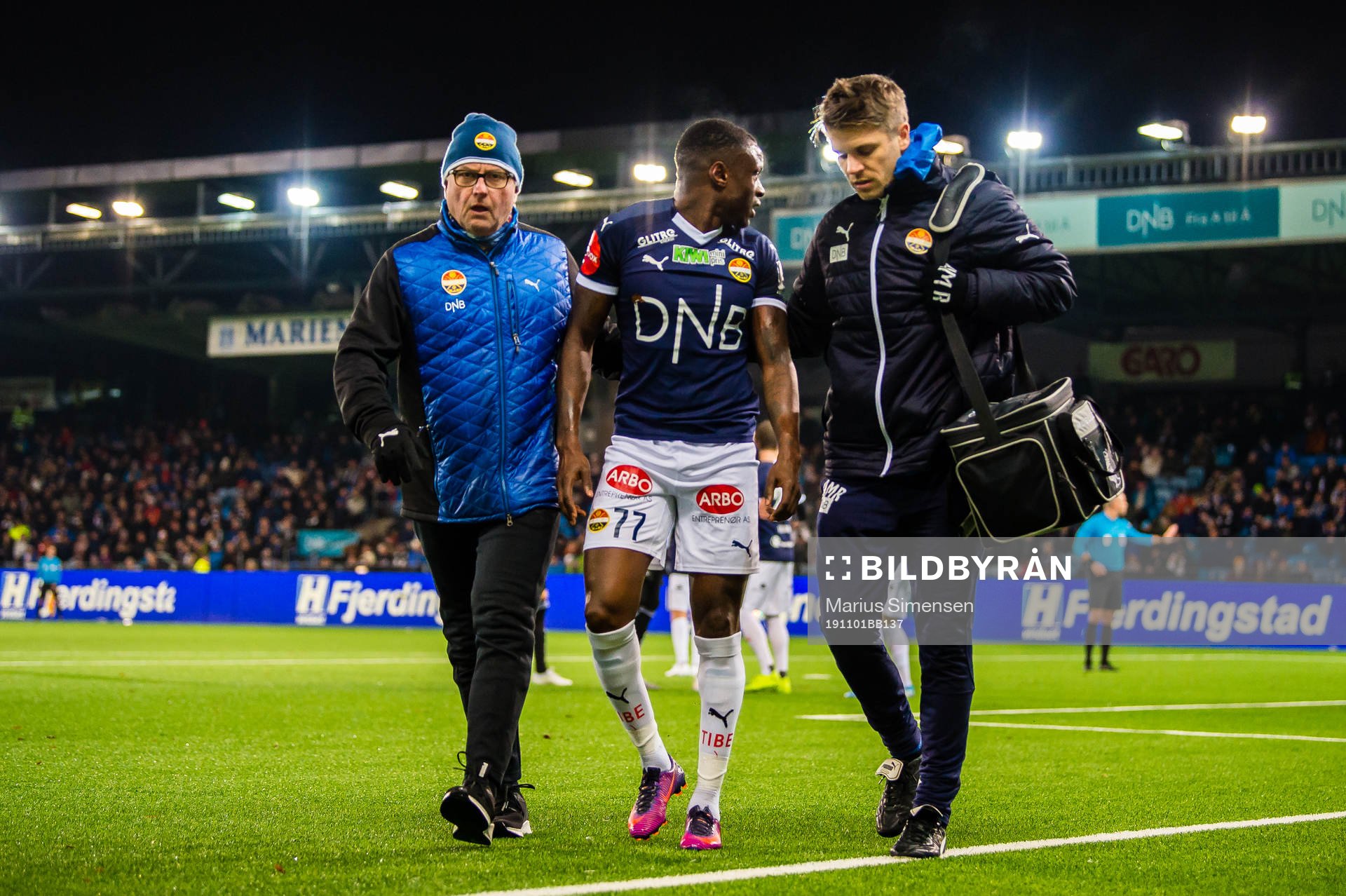 Muhamed Maudo Keita of Strømsgodset leaves the pitch with an injury during the Eliteserien match between Strømsgodset and Rosenborg on November 1, 2019 in Drammen.