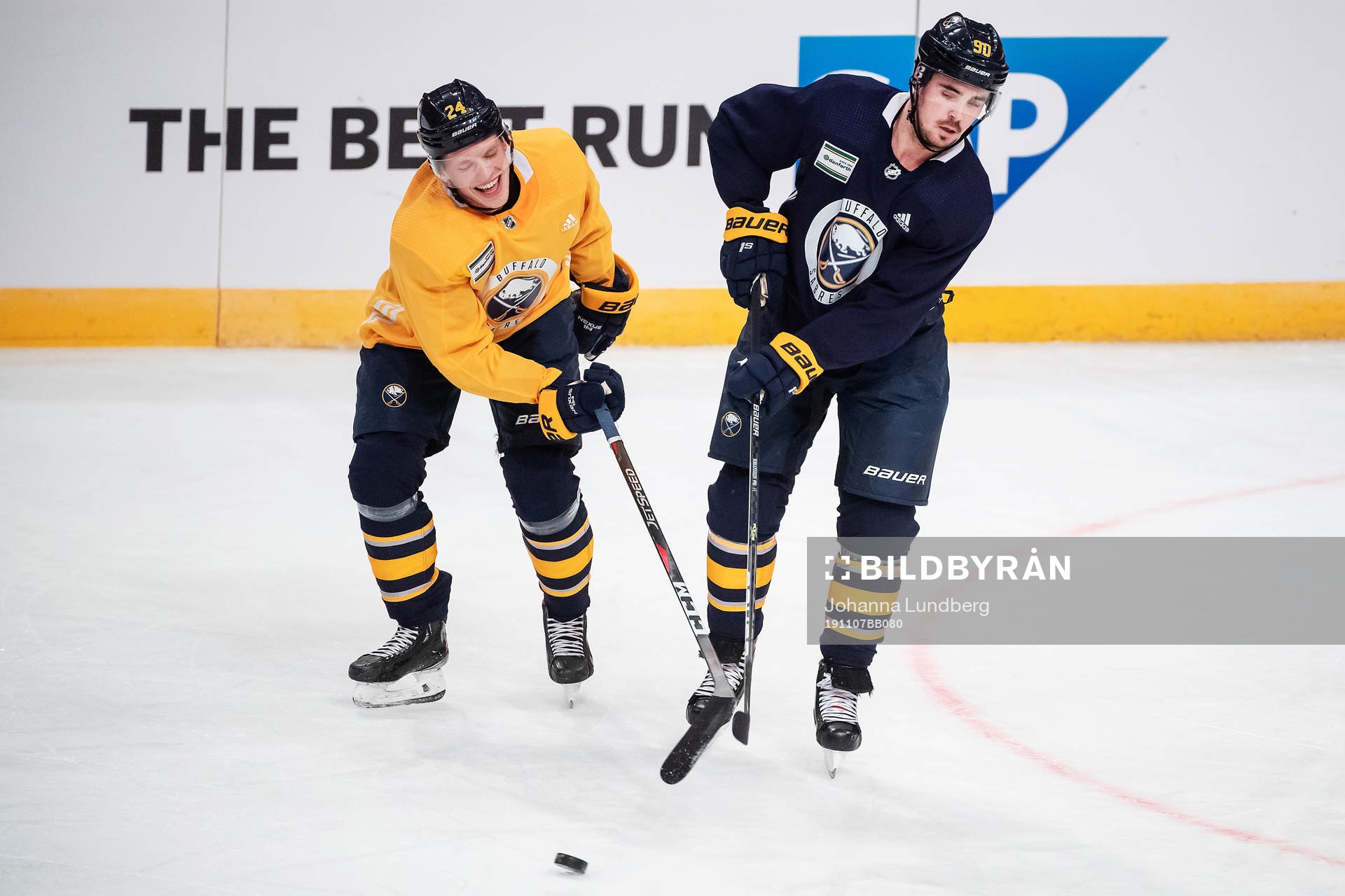 Lawrence Pilut and Marcus Johansson of Buffalo Sabres