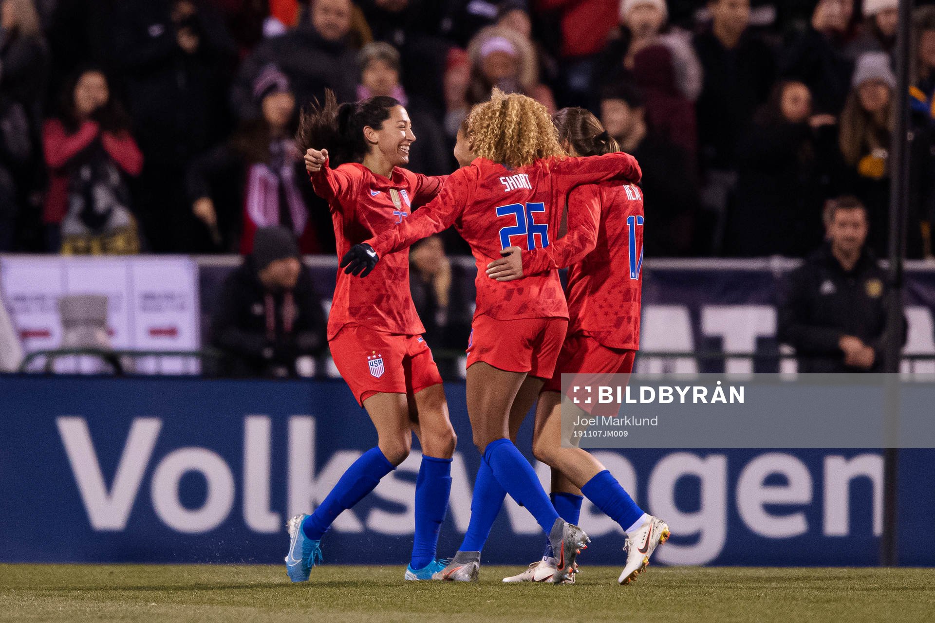 Christen Press, Casey Short and Tobin Heath of USA