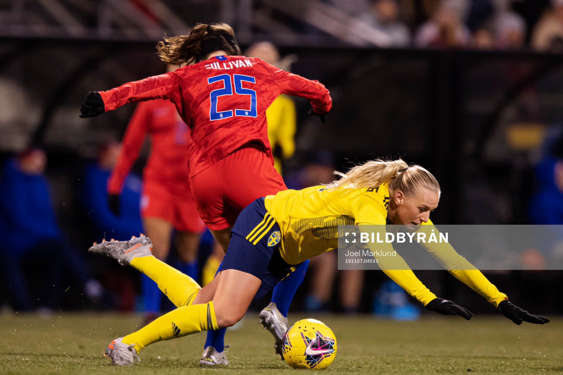 Andi Sullivan of USA trips Stina Blackstenius of Sweden