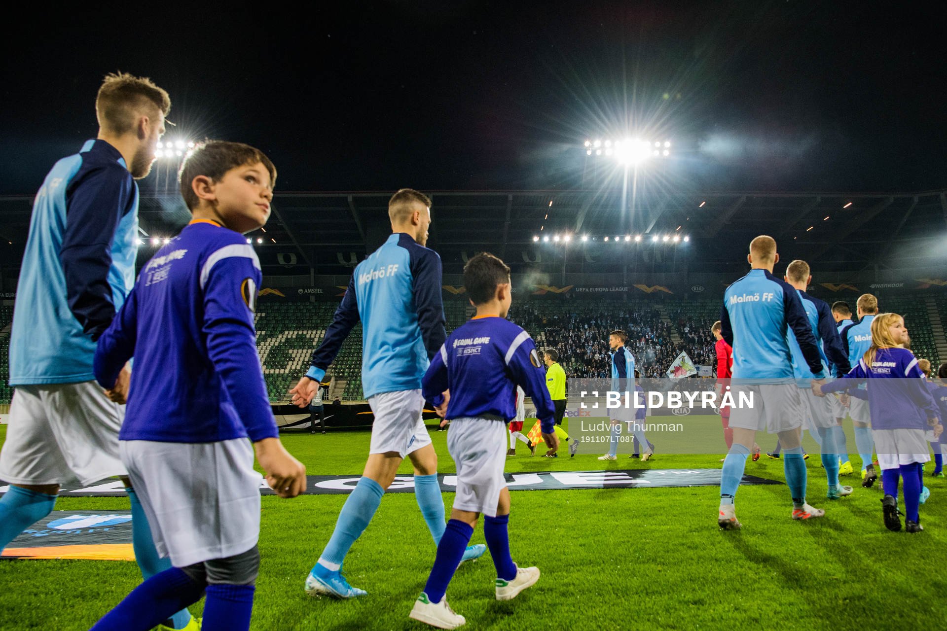 Players of Malmö FF enter the pitch ahead the Europa