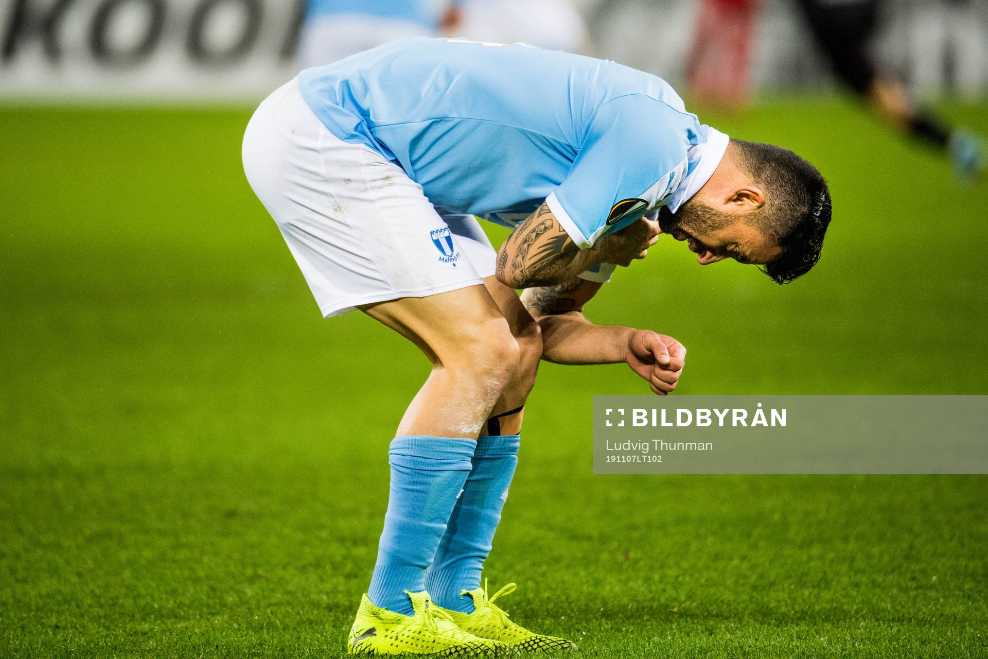 Behrang Safari grabs his arm