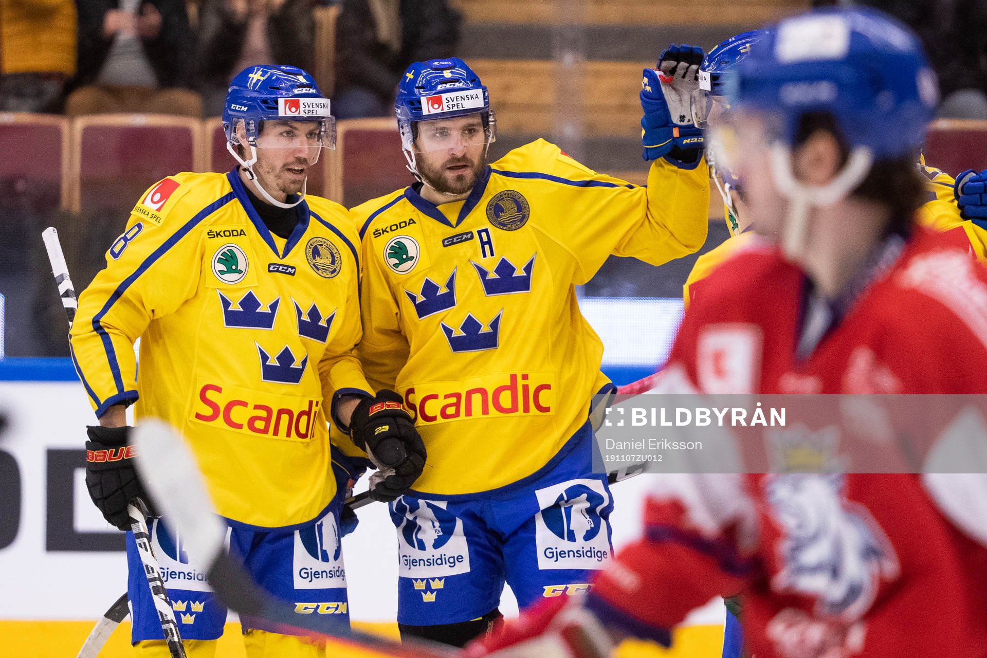Mikael Wikstrand of Sweden cheering with Anton Rödin of