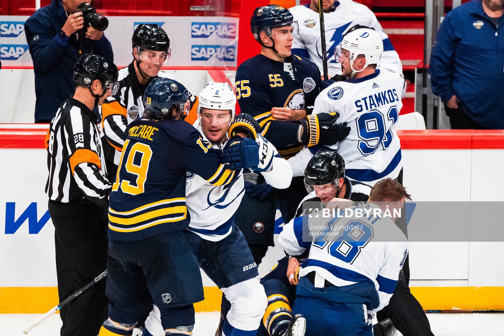 Jake McCabe, Jeff Skinner and Rasmus Ristolainen of Buffalo