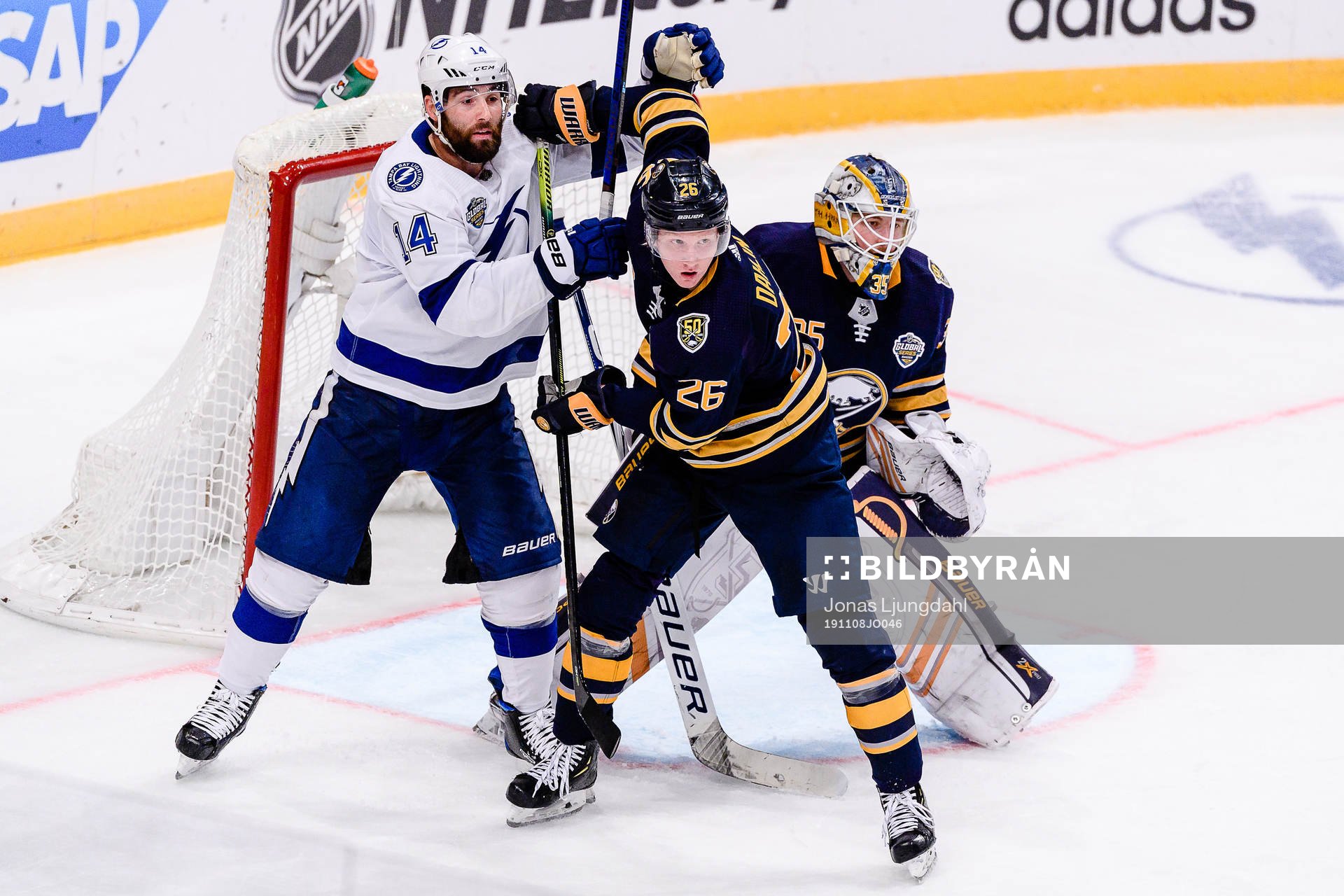 Patrick Maroon of Tampa Bay Lightning and Rasmus Dahlin and