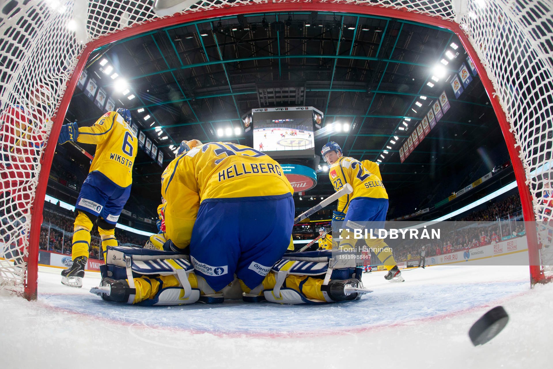 Kirill Semyonov #94, RUS score 1-3, Magnus Hellberg #35,