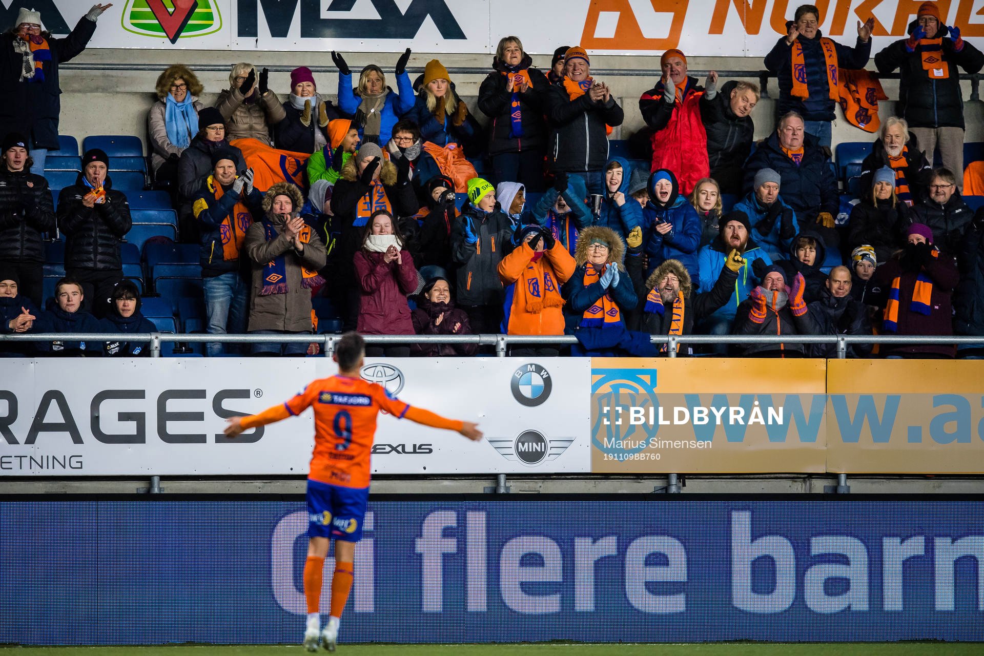 Spectators in the stands celebrates