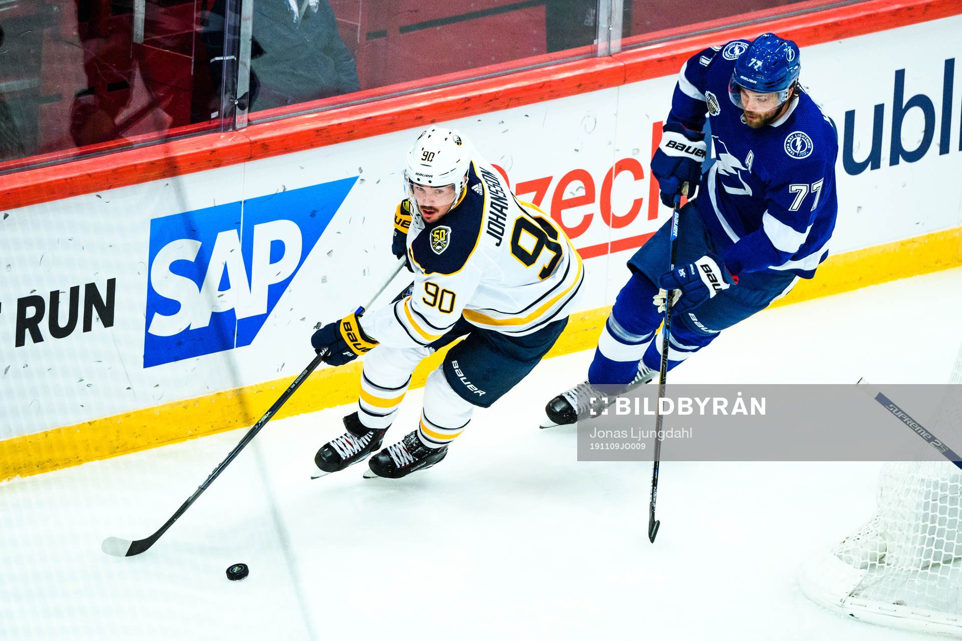 Marcus Johansson of Buffalo Sabres and Victor Hedman of
