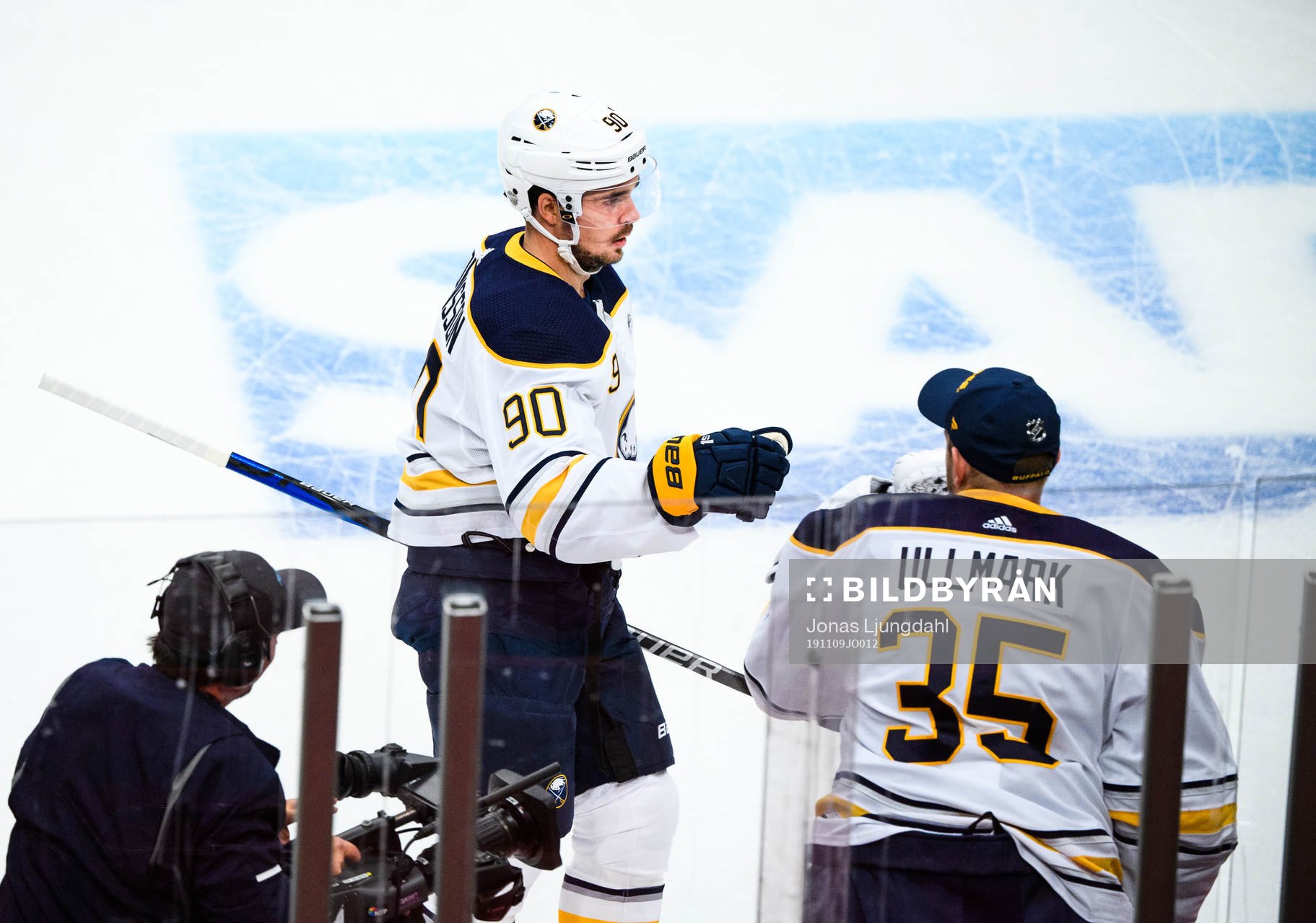 Marcus Johansson and goalkeeper Linus Ullmark of Buffalo
