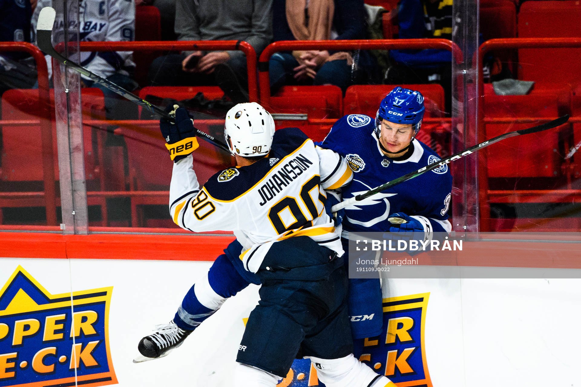 Marcus Johansson of Buffalo Sabres and Yanni Gourde of