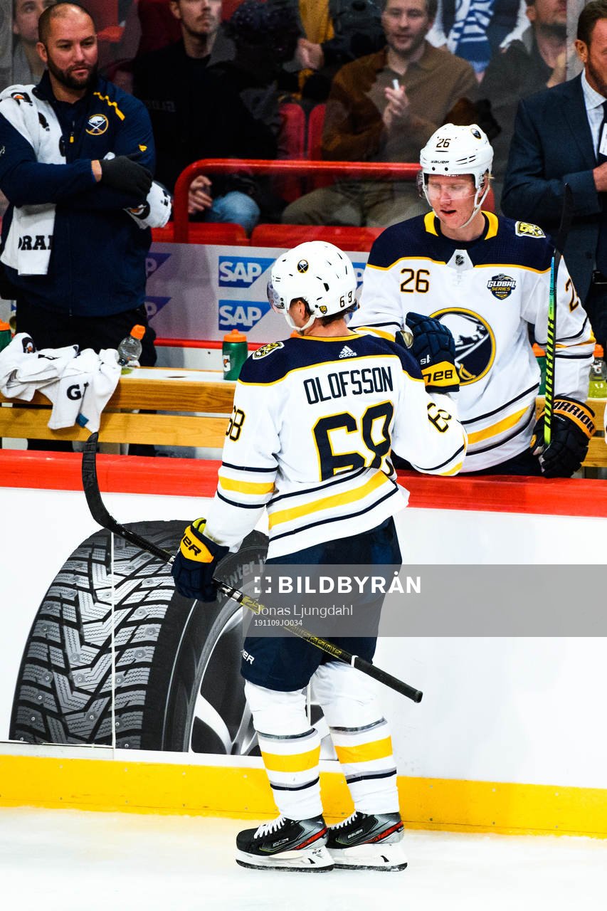 Victor Olofsson and Rasmus Dahlin of Buffalo Sabres
