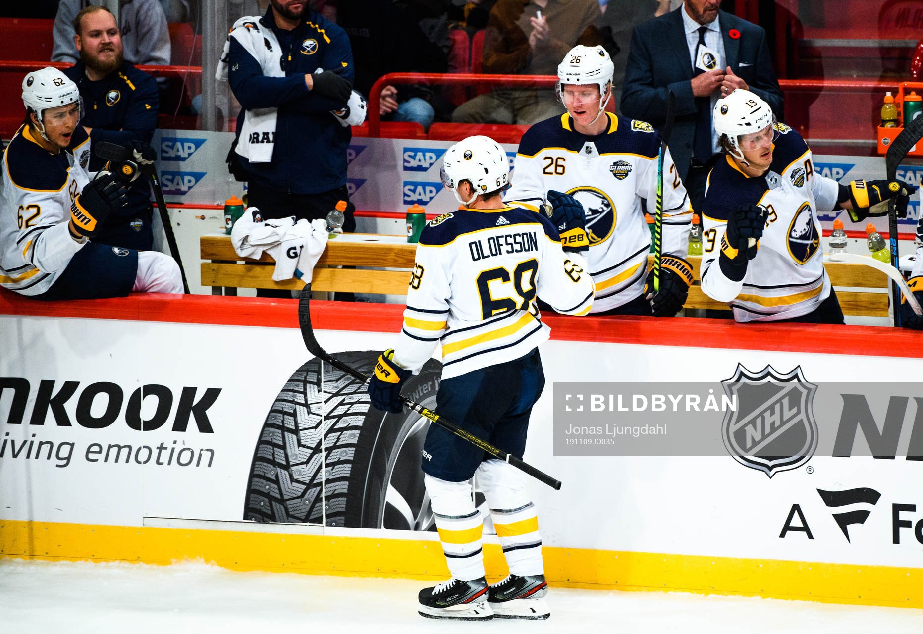 Victor Olofsson and Rasmus Dahlin of Buffalo Sabres