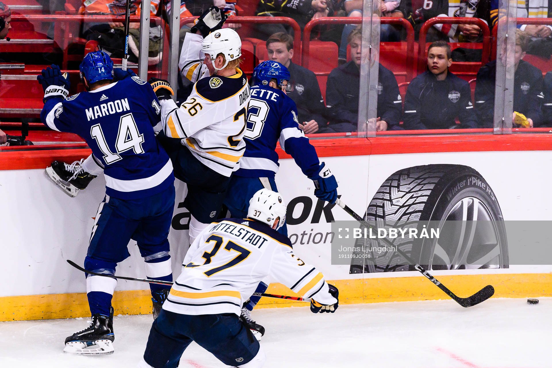 Rasmus Dahlin of Buffalo Sabres gets hit by Patrick Maroon