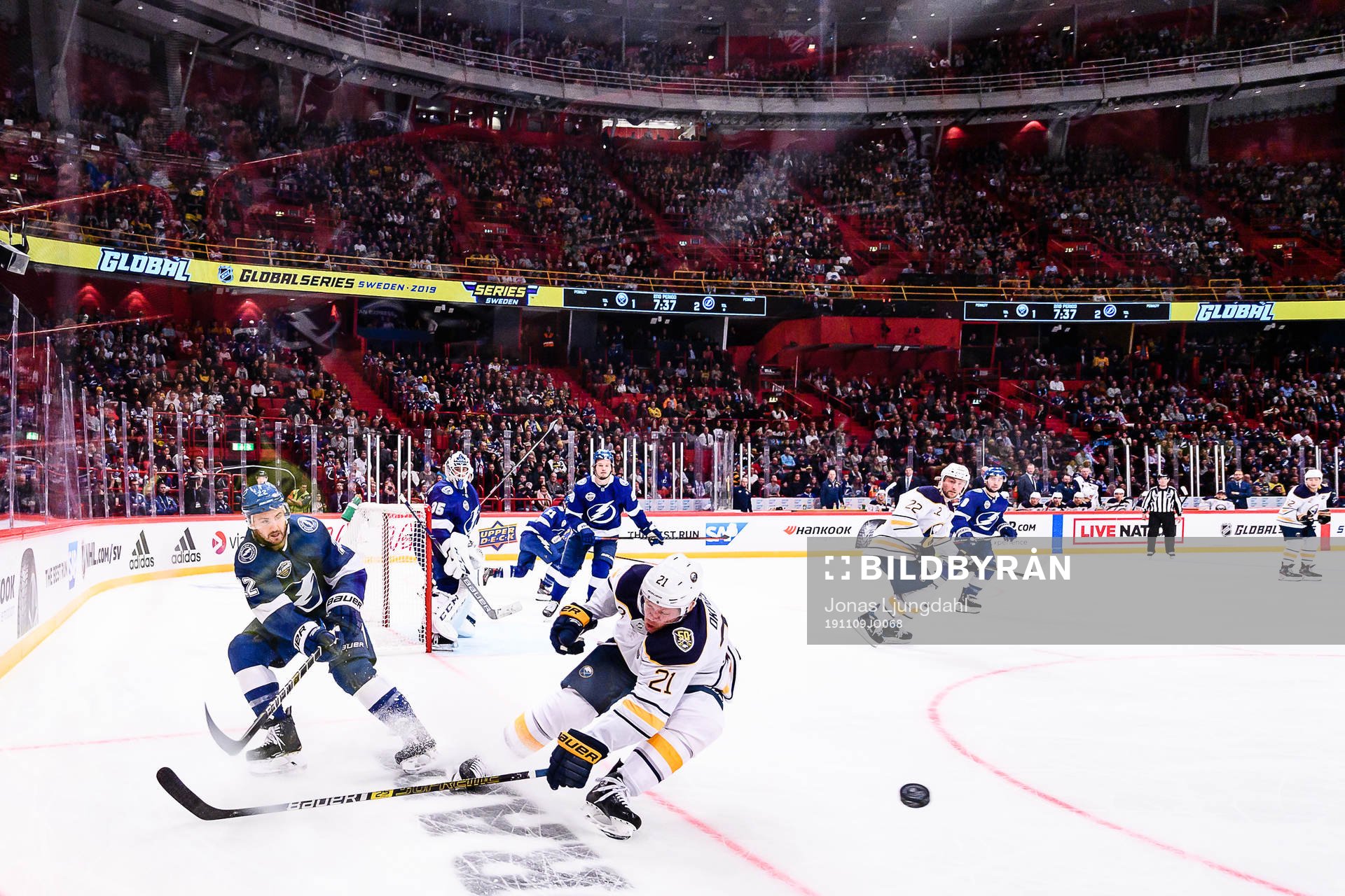 Kevin Shattenkirk of Tampa Bay Lightning and Kyle Okposo of