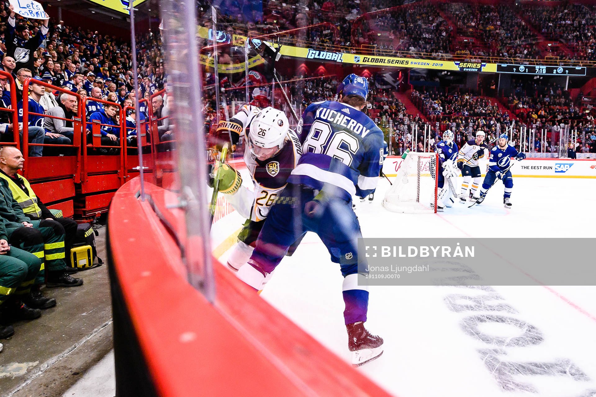 Nikita Kucherov of Tampa Bay Lightning hits Rasmus Dahlin