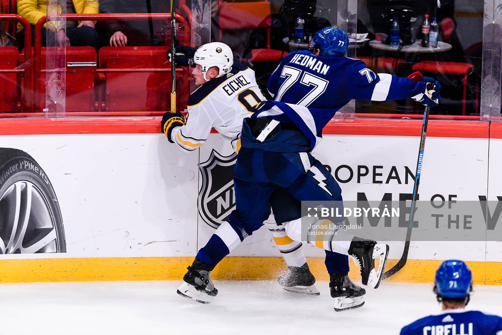 Victor Hedman of Tampa Bay Lightning hits Jimmy Vesey of