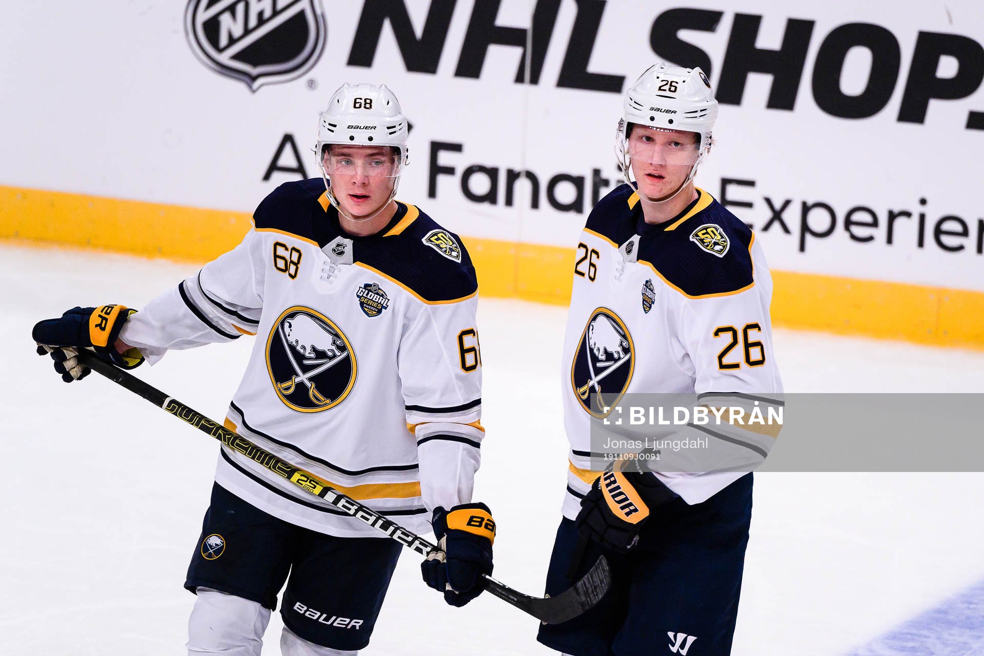 Victor Olofsson and Rasmus Dahlin of Buffalo Sabres