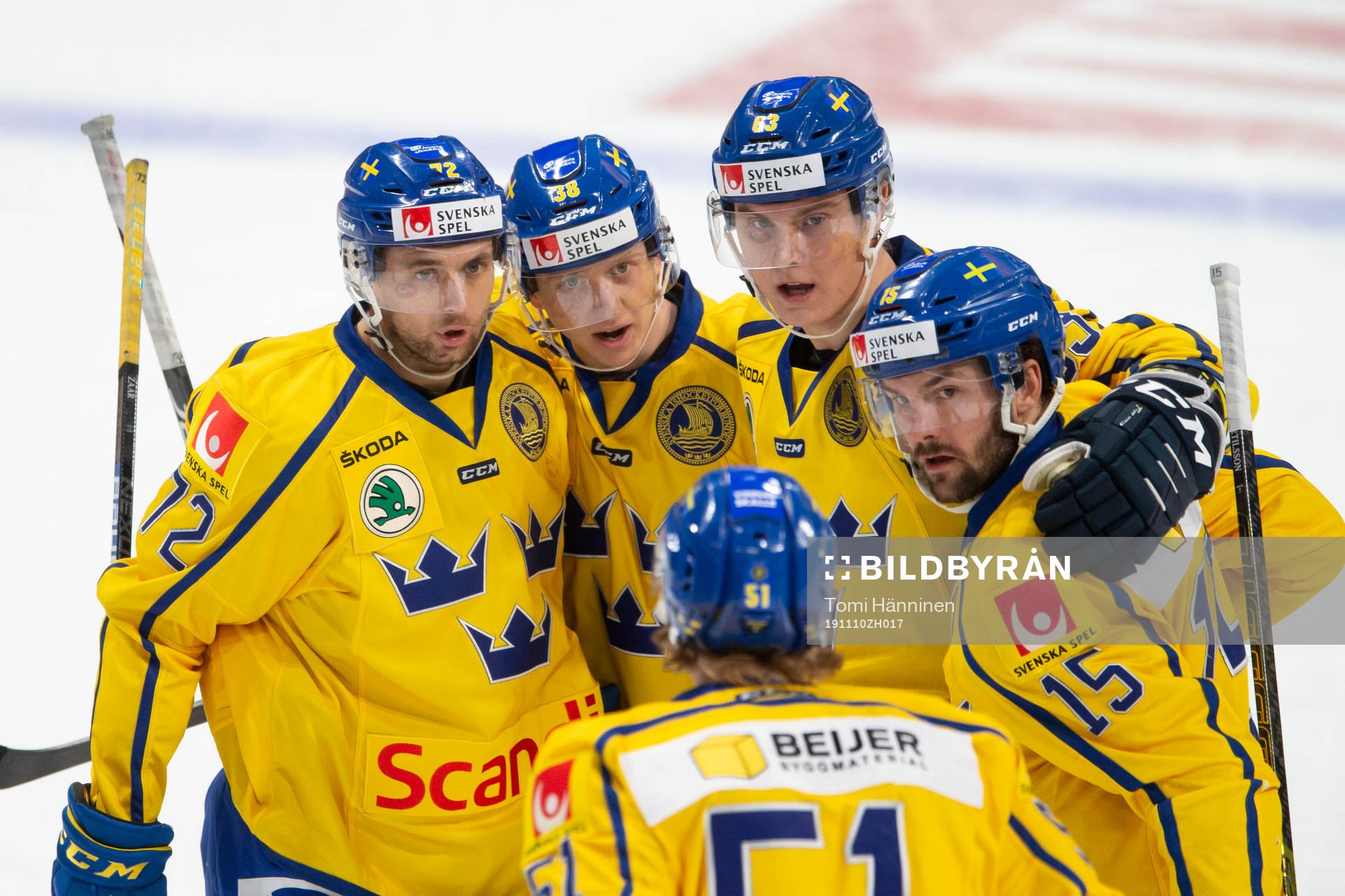 Olle Alsing #38, SWE 2-1 celebrating with team mates Daniel