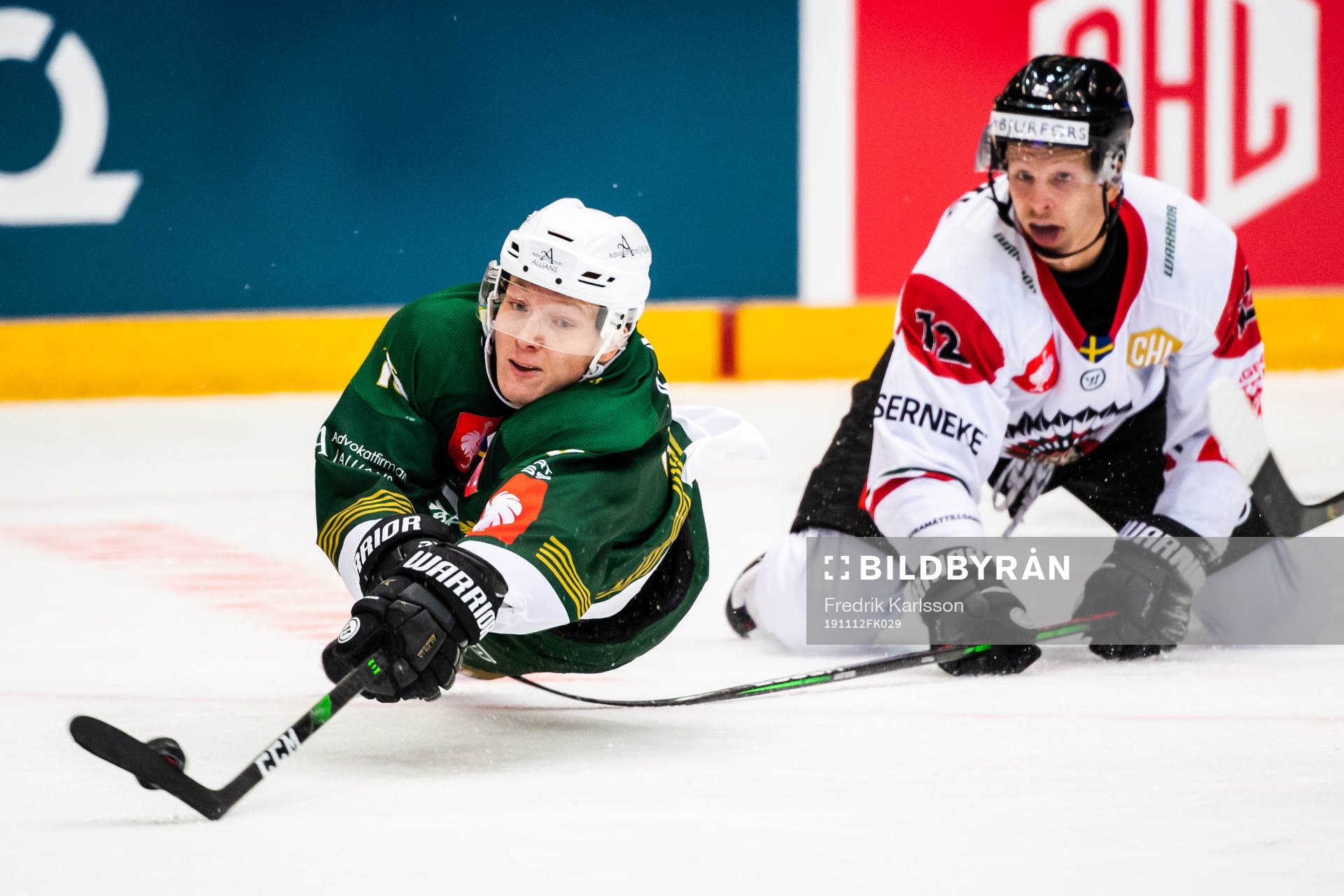 Gustav Rydahl of Färjestad and Max Friberg of Frölunda
