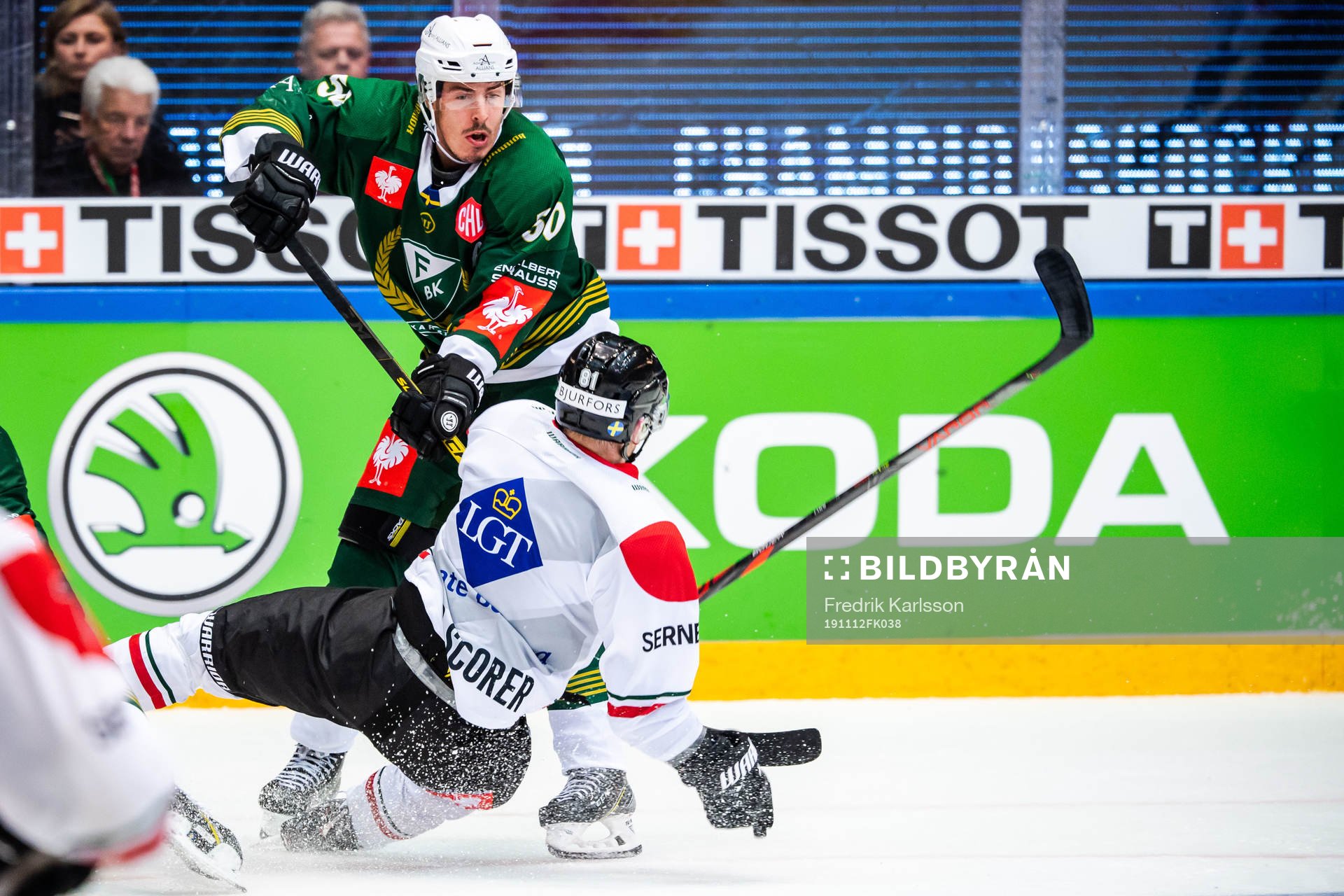 Sebastian Erixon of Färjestad and Ryan Lasch of Frölunda