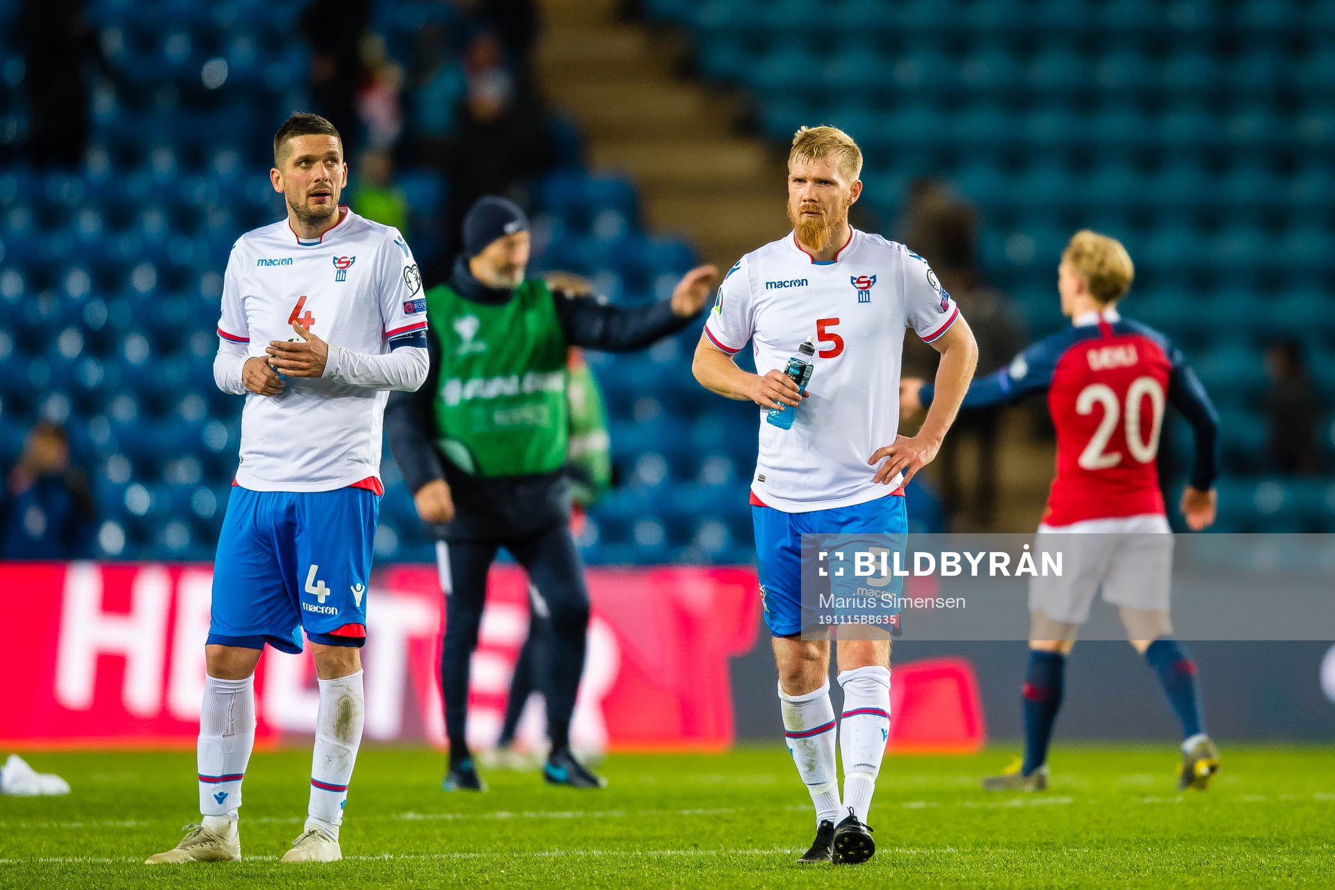 Atli Gregersen and Odmar Faero of Faroe Islands looks dejected after the UEFA Euro qualifier football match between Norway and Faroe Islands on November 15, 2019 in Oslo.