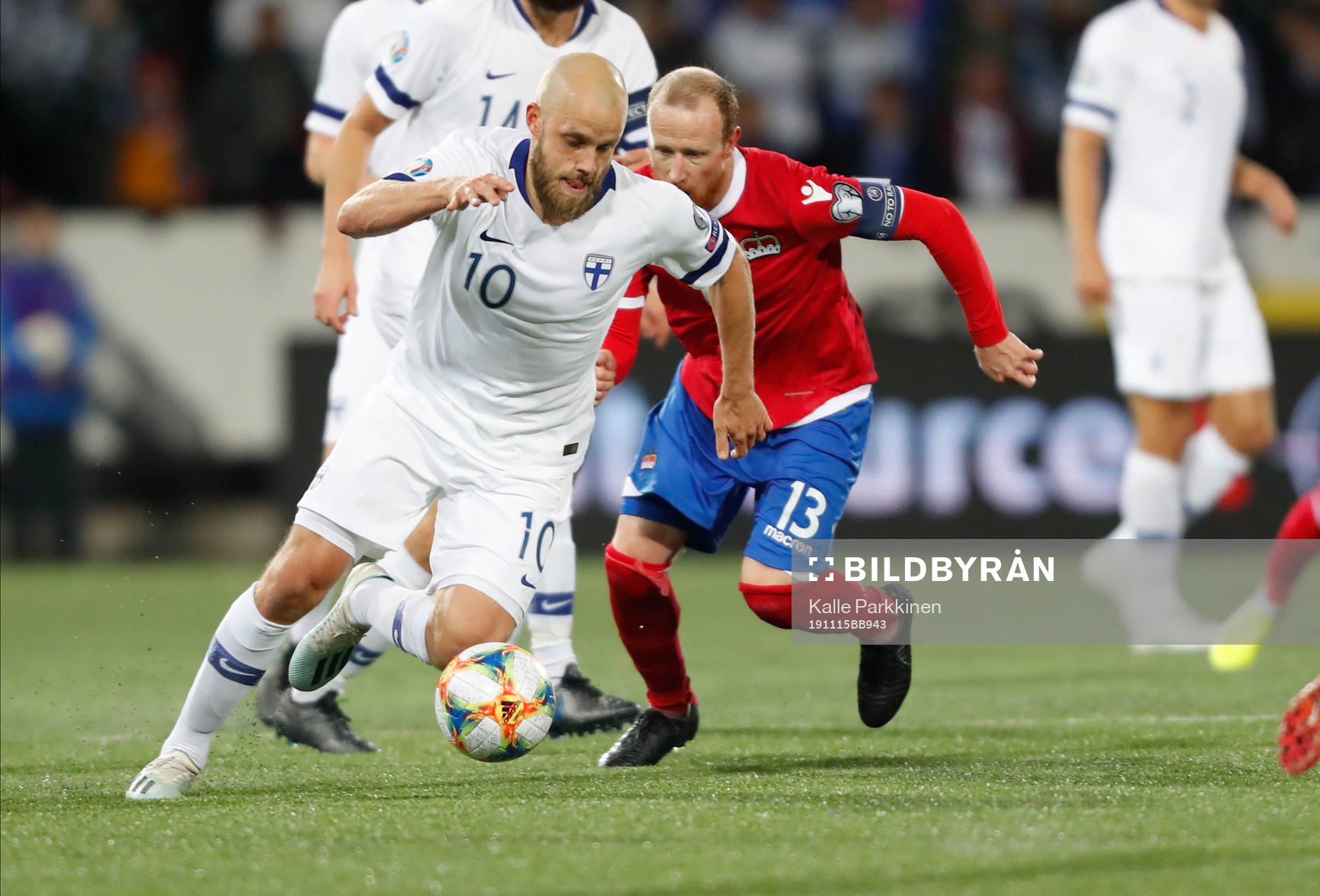 Teemu Pukki #10, FIN and Martin Büchel #13, LIE