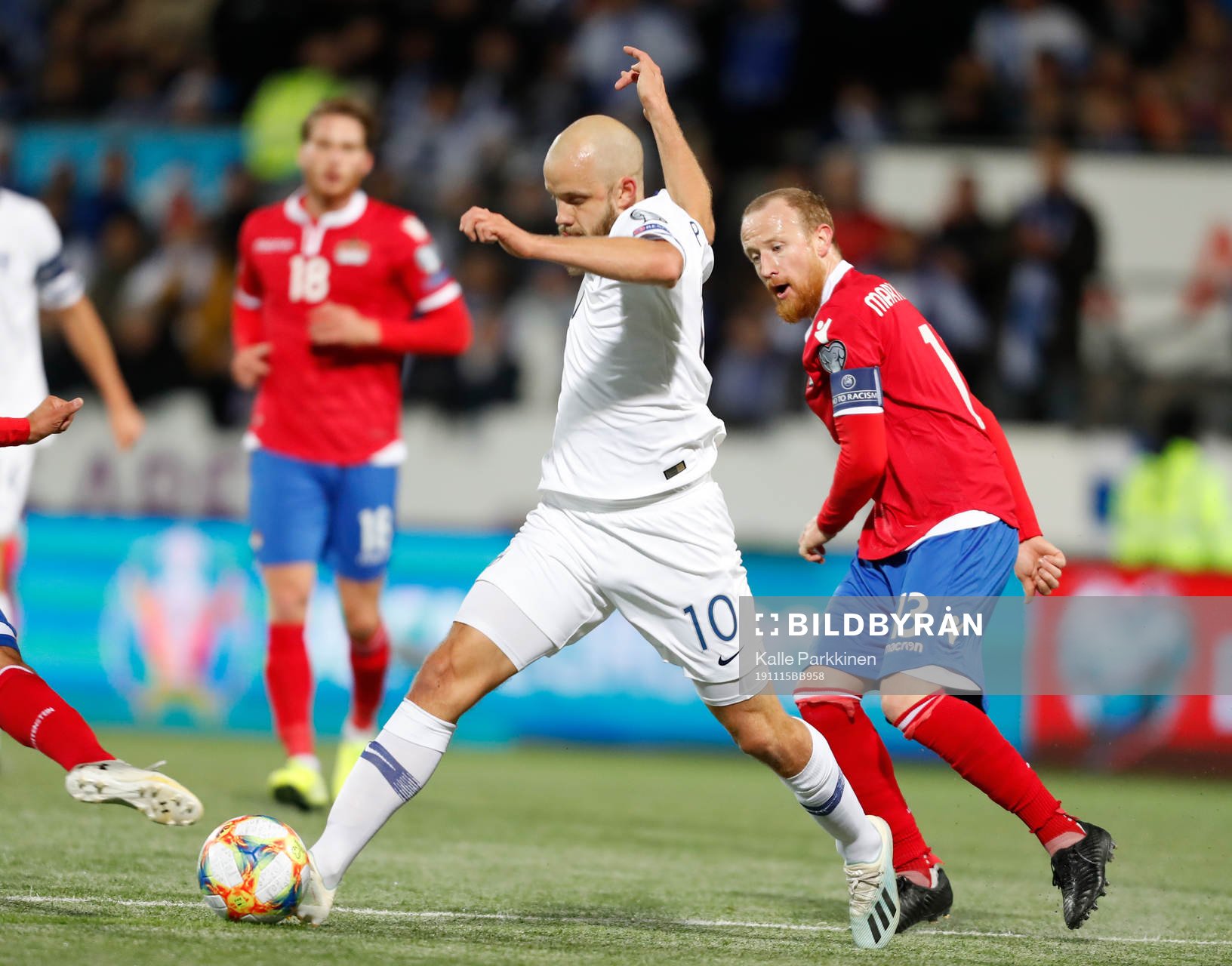 Teemu Pukki #10, FIN and lMartin Büchel #13, LIE