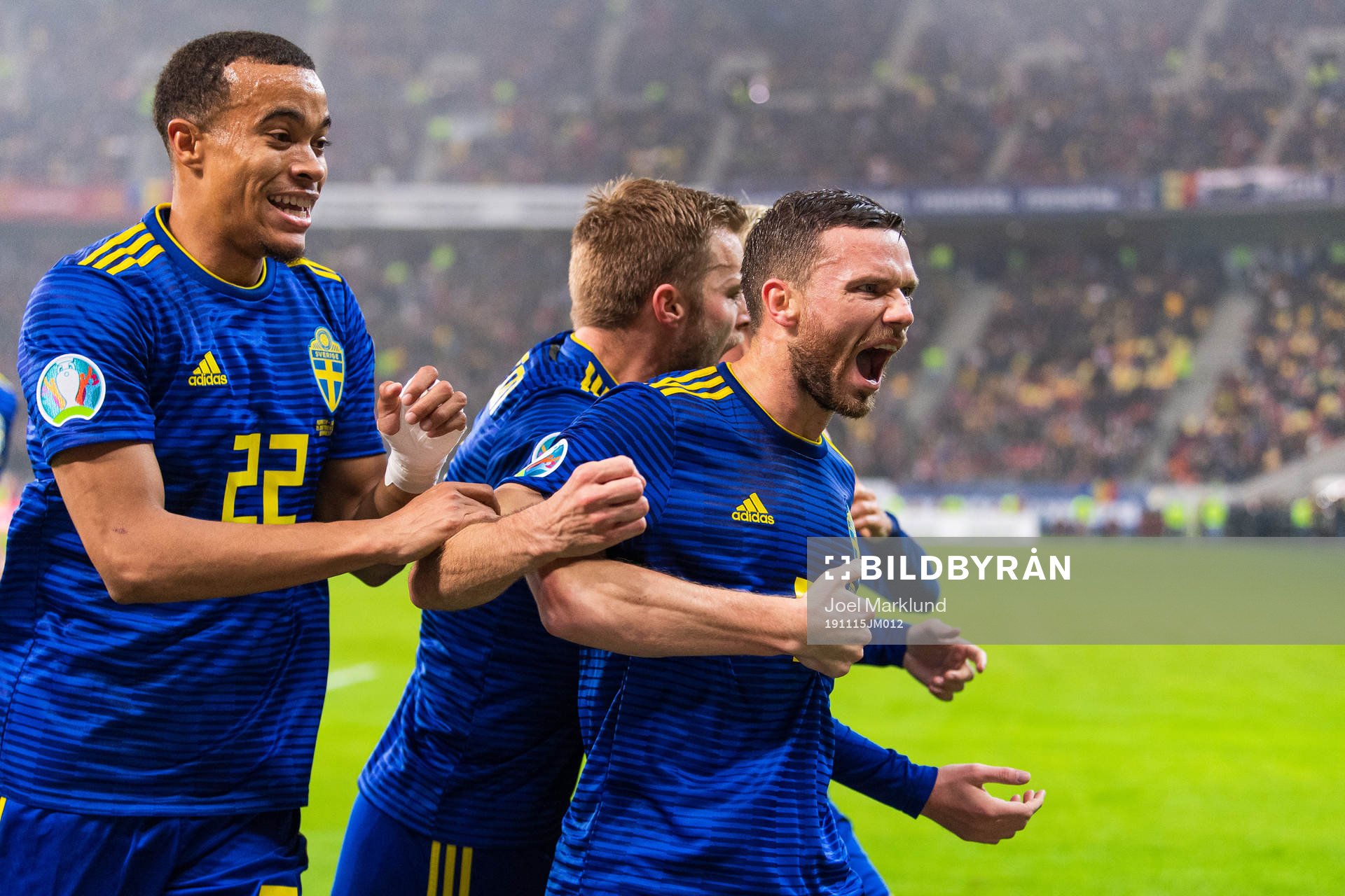 Robin Quaison and Sebastian Larsson celebrate with Marcus