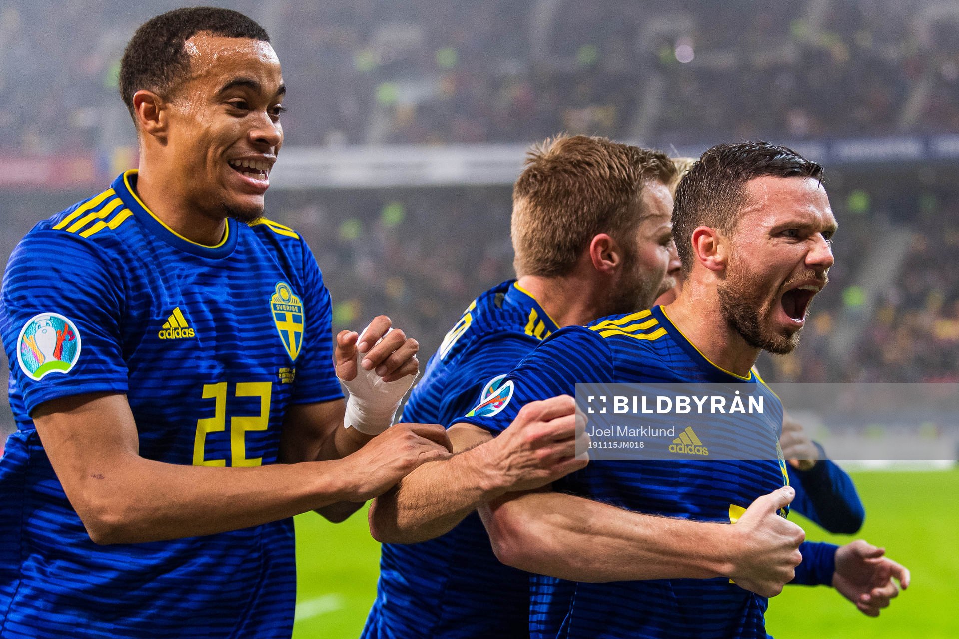 Robin Quaison and Sebastian Larsson celebrate with Marcus