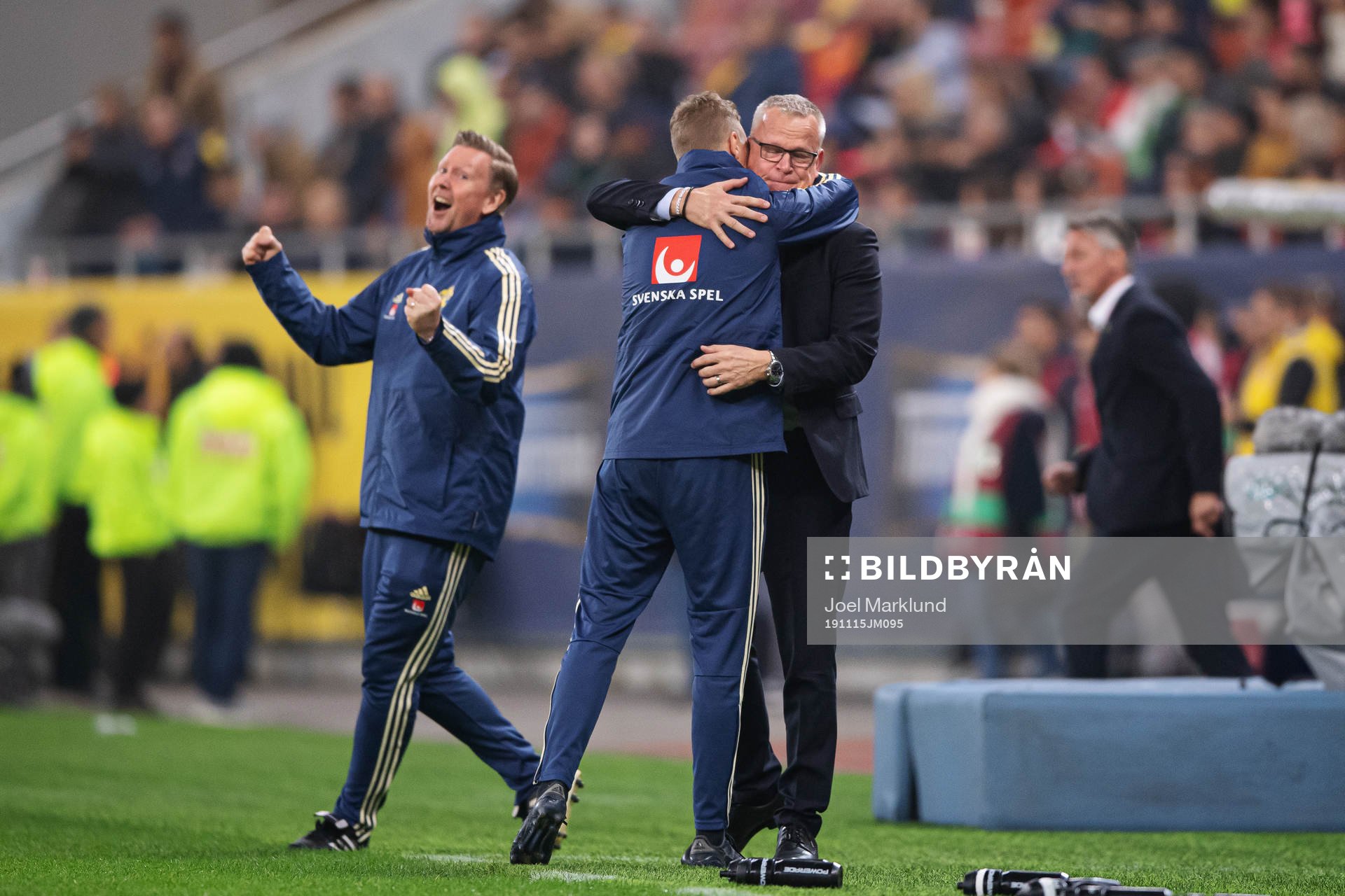 Peter Wettergren, assistant coach, Maths Elfvendal, goalkeeper coach, and Janne Andersson, head coach of Sweden, celebrate after the UEFA Euro Qualifier football match between Romania and Sweden on November 15, 2019 in Bucharest.