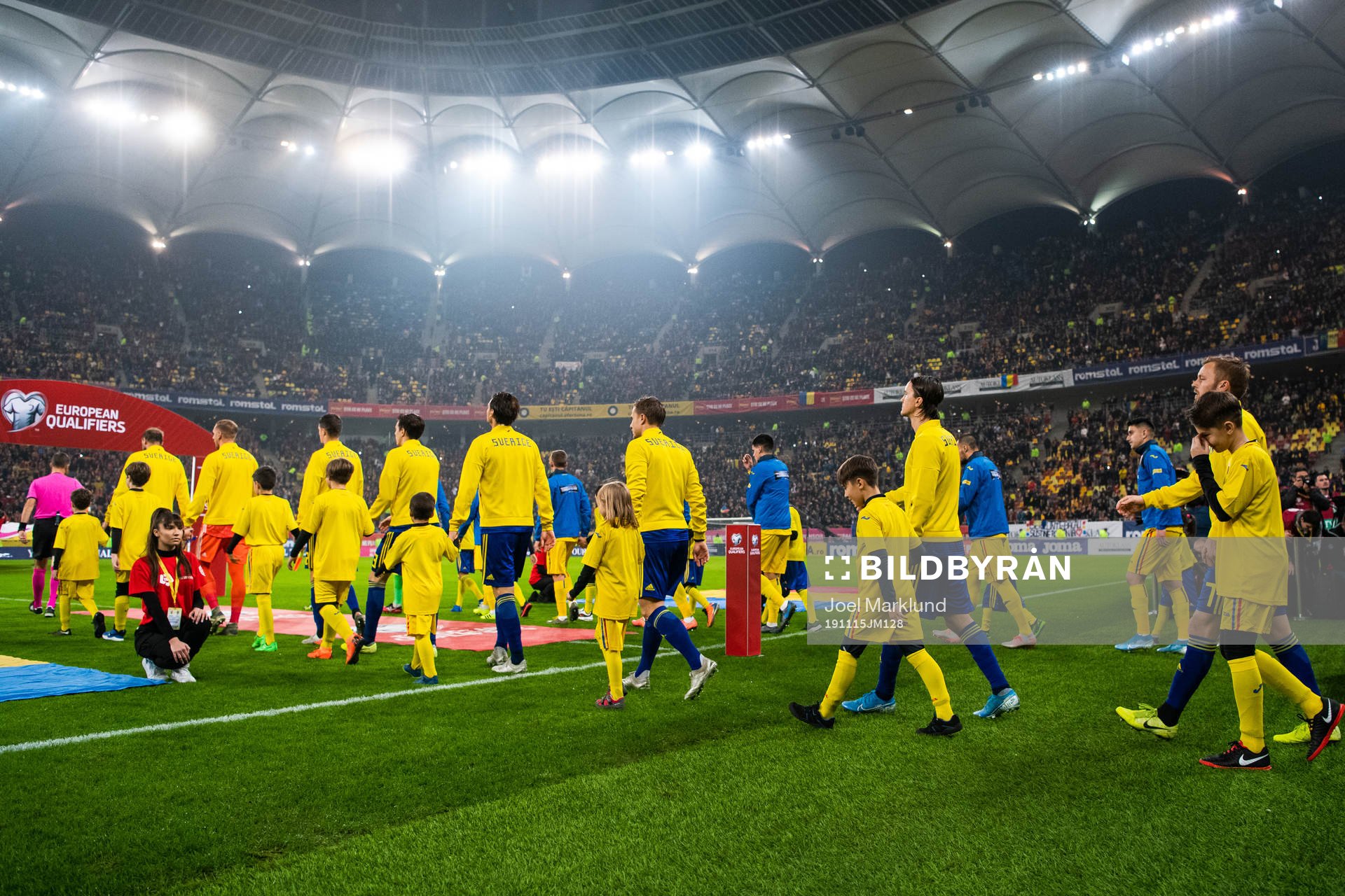 Players of Sweden enter the pitch