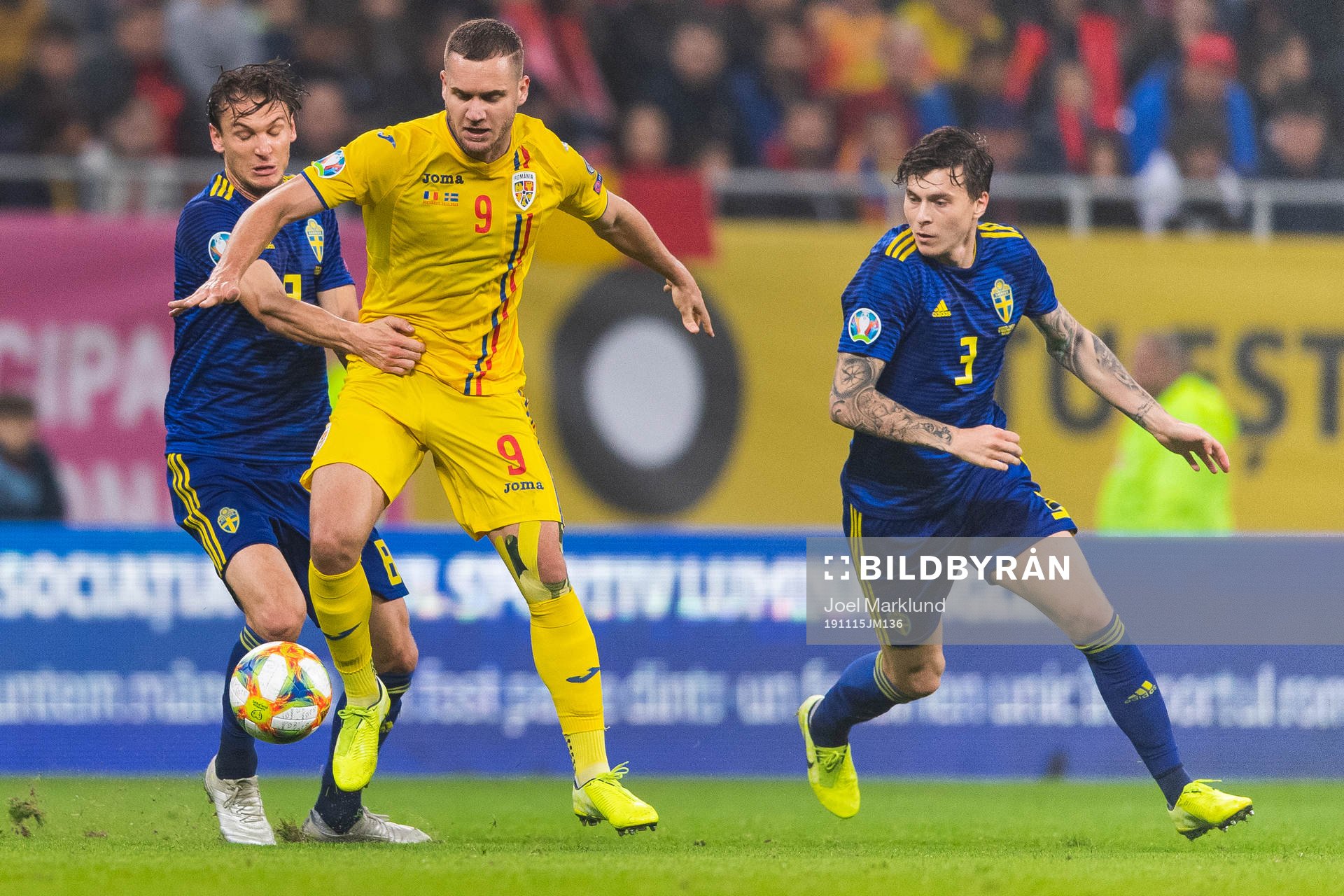 Albin Ekdal of Sweden and George Puscas of Romania compete