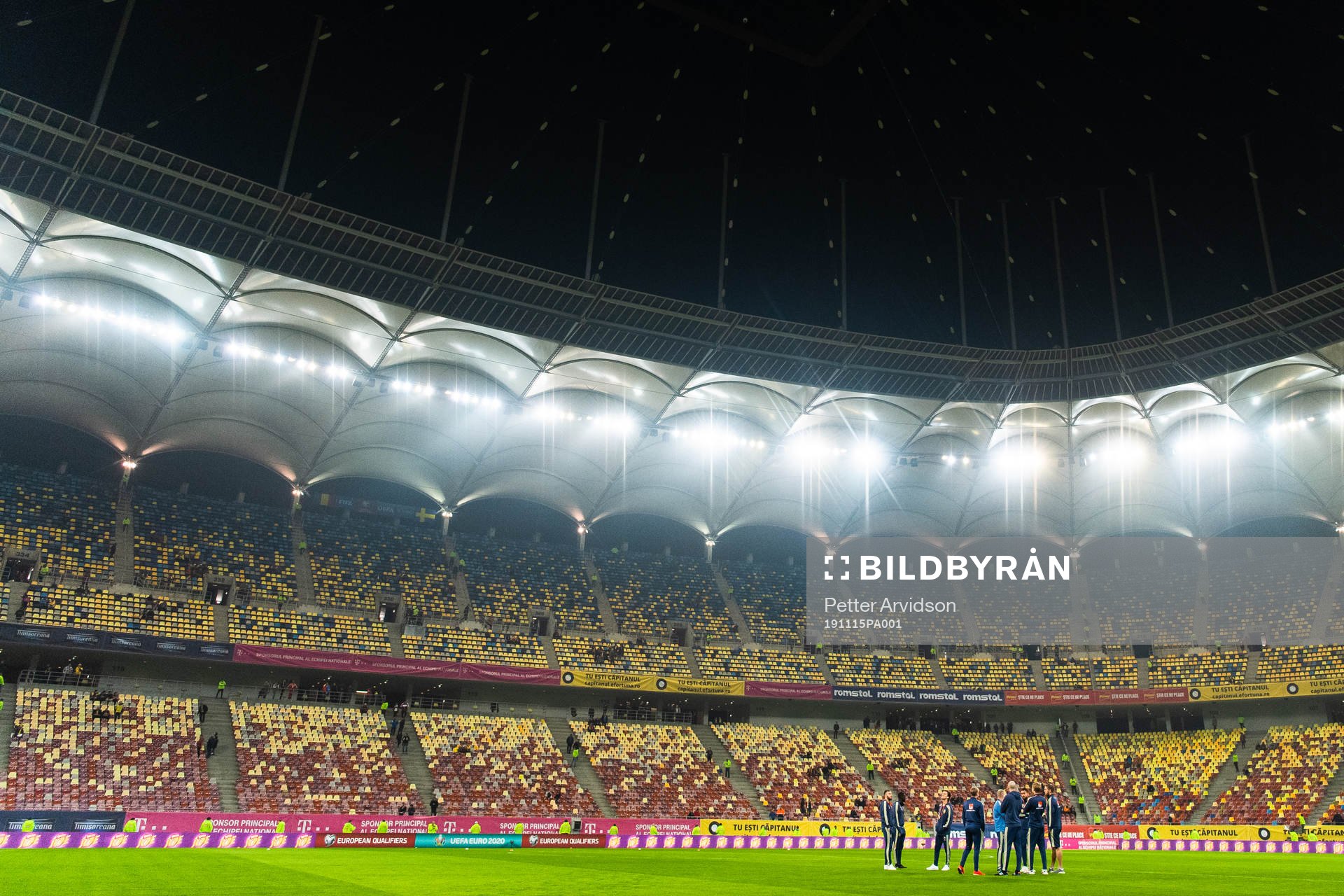 Players of Sweden inspect the pitch