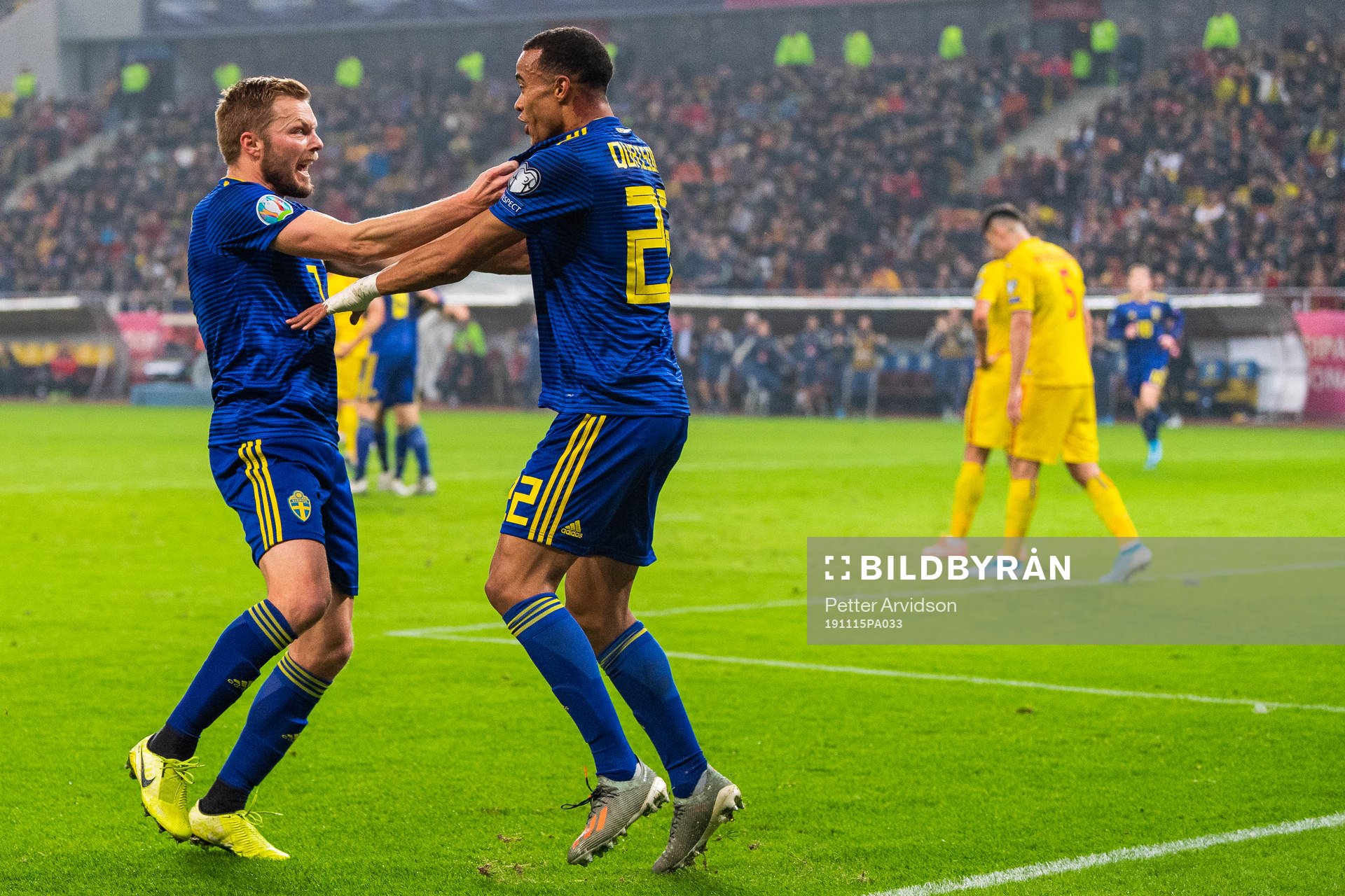 Sebastian Larsson and Robin Quaison of Sweden celebrate 0-2