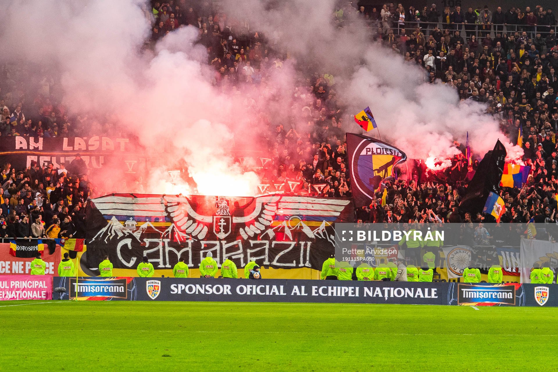 Fans of Romania burning bengals