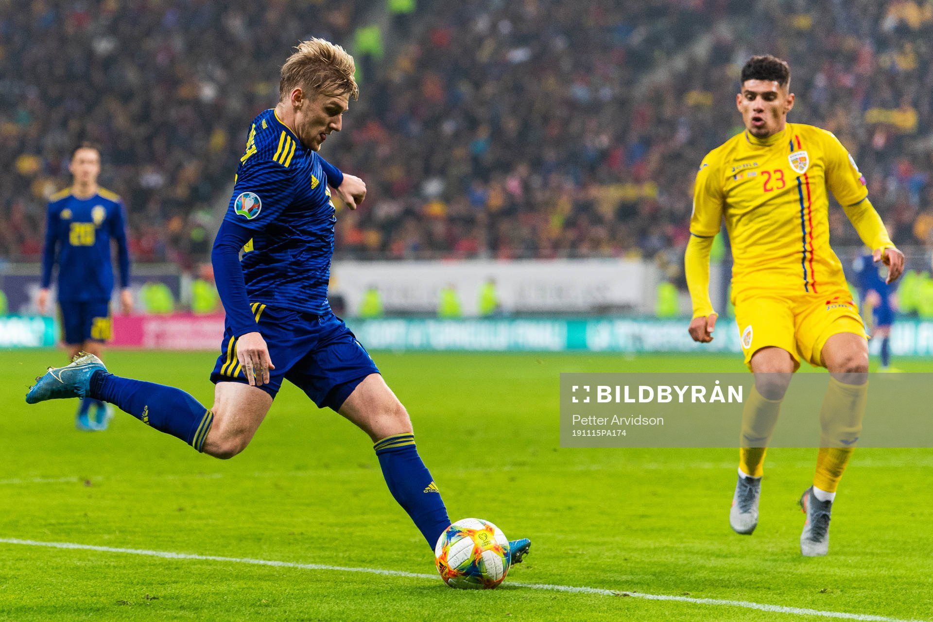 Emil Forsberg of Sweden and Florinel Coman of Romania