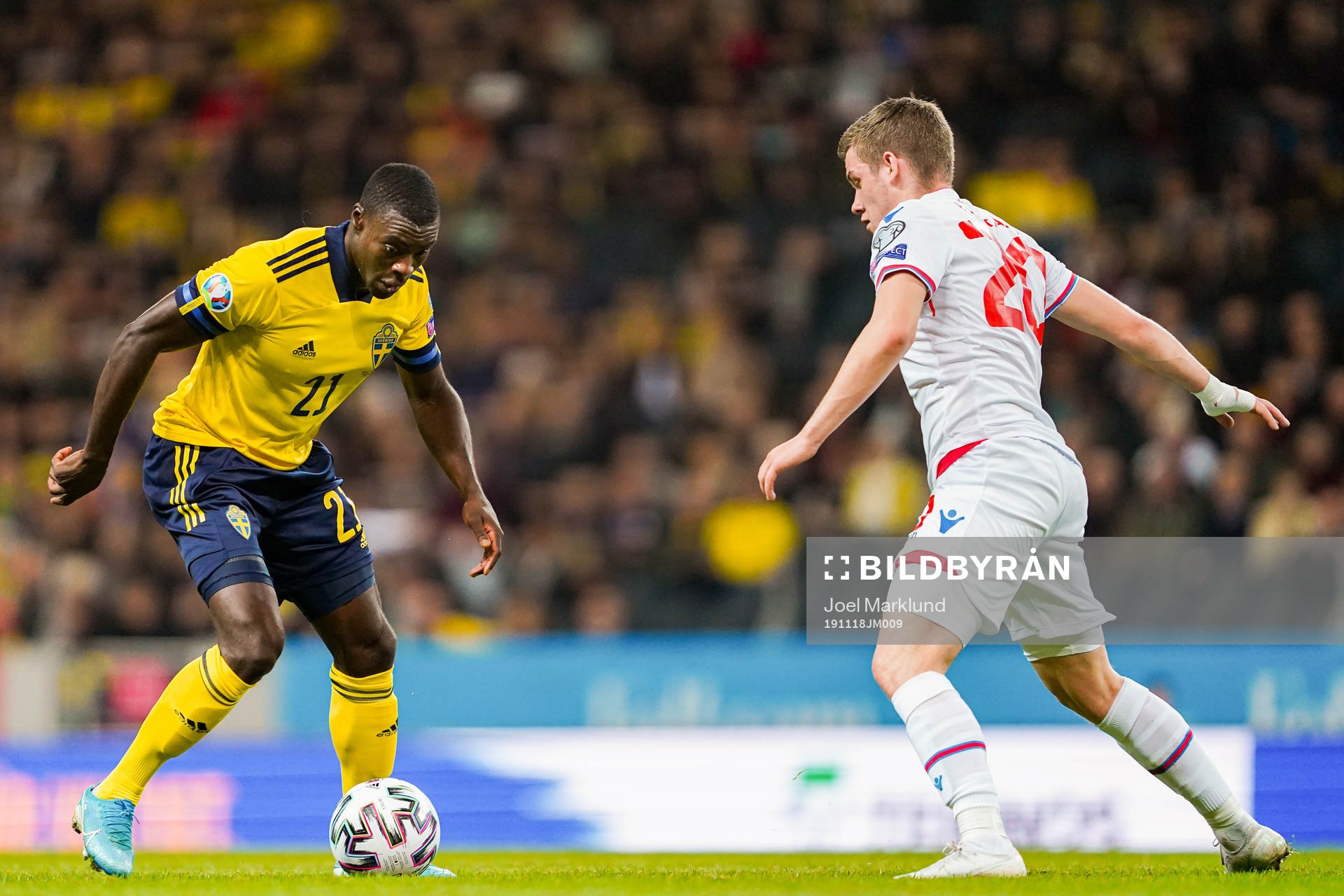 Ken Sema of Sweden and Joannes Bjartalid of Faroe Islands