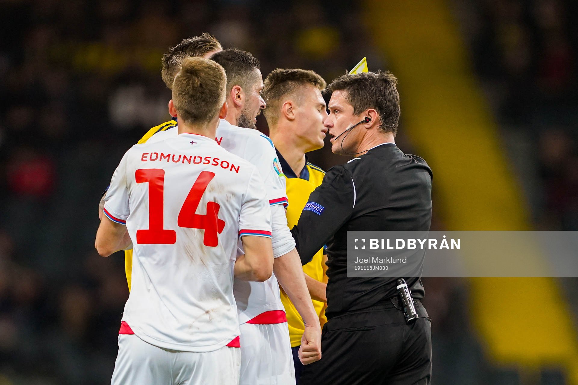 Mattias Svanberg of Sweden receives a yellow card