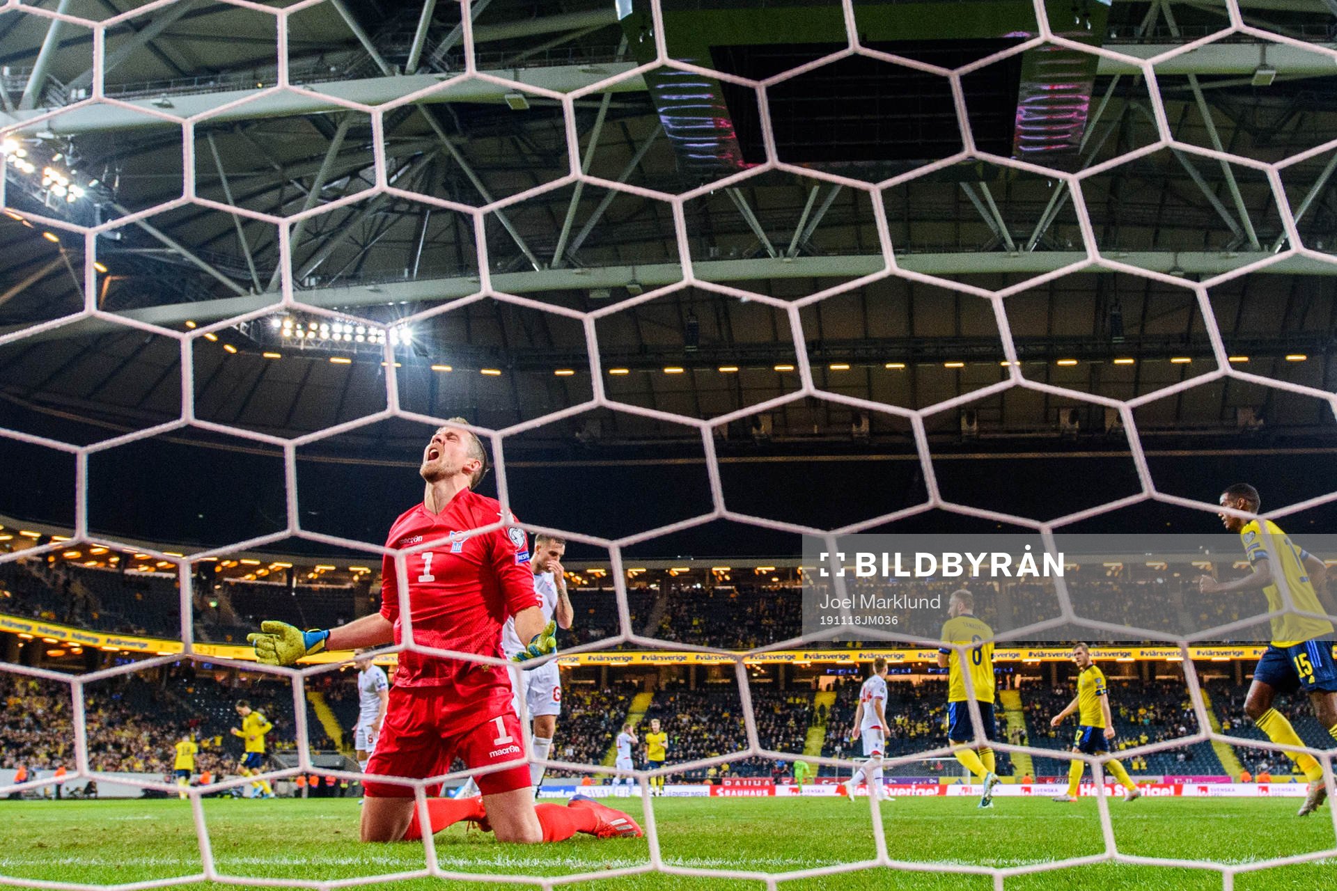 Goalkeeper Gunnar Nielsen of Faroe Islands looks dejected