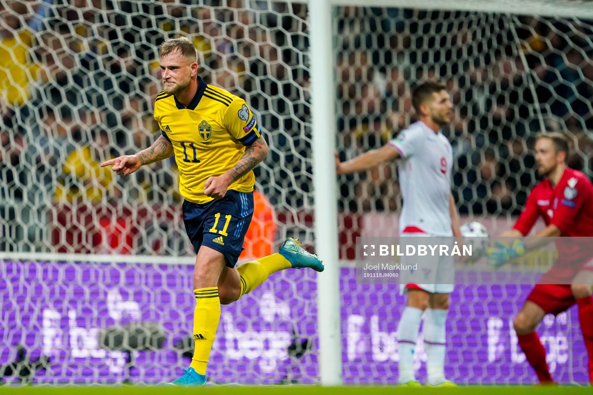 John Guidetti of Sweden celebrates
