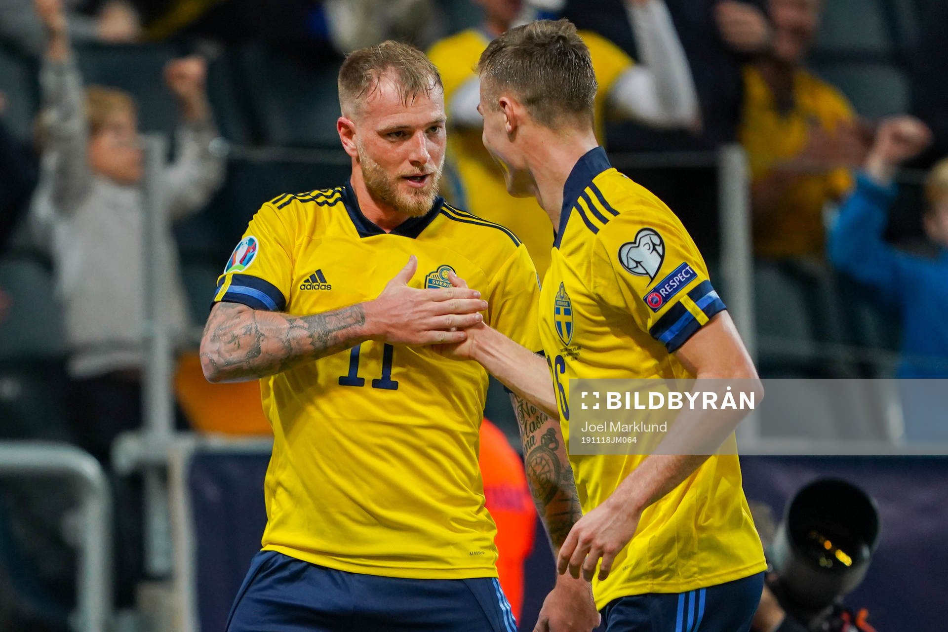 John Guidetti of Sweden celebrate with Mattias Svanberg after scoring the 3-0 goal during the UEFA Euro Qualifier football match between Sweden and Faroe Islands on November 18, 2019 in Stockholm.