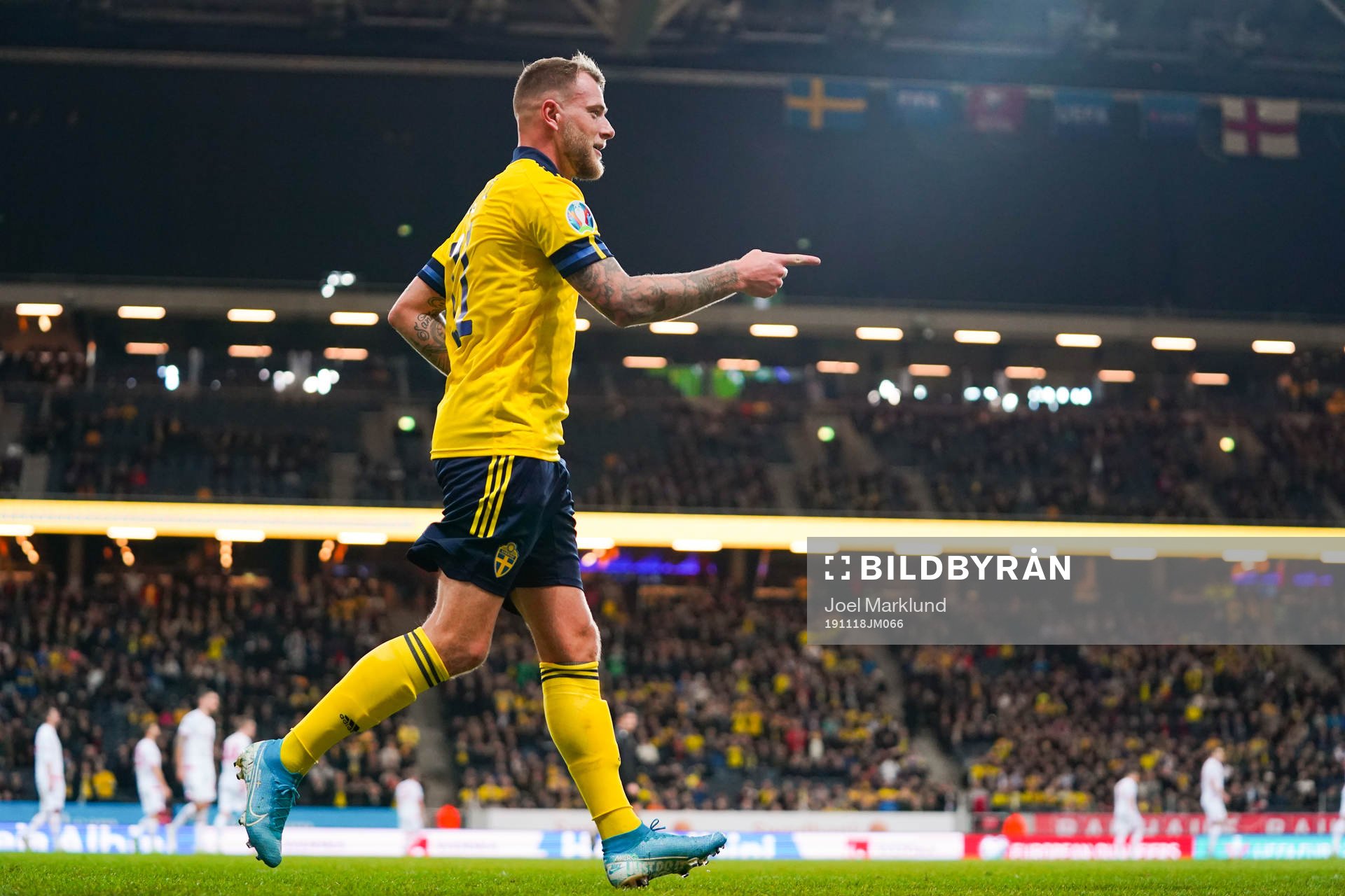 John Guidetti of Sweden celebrates