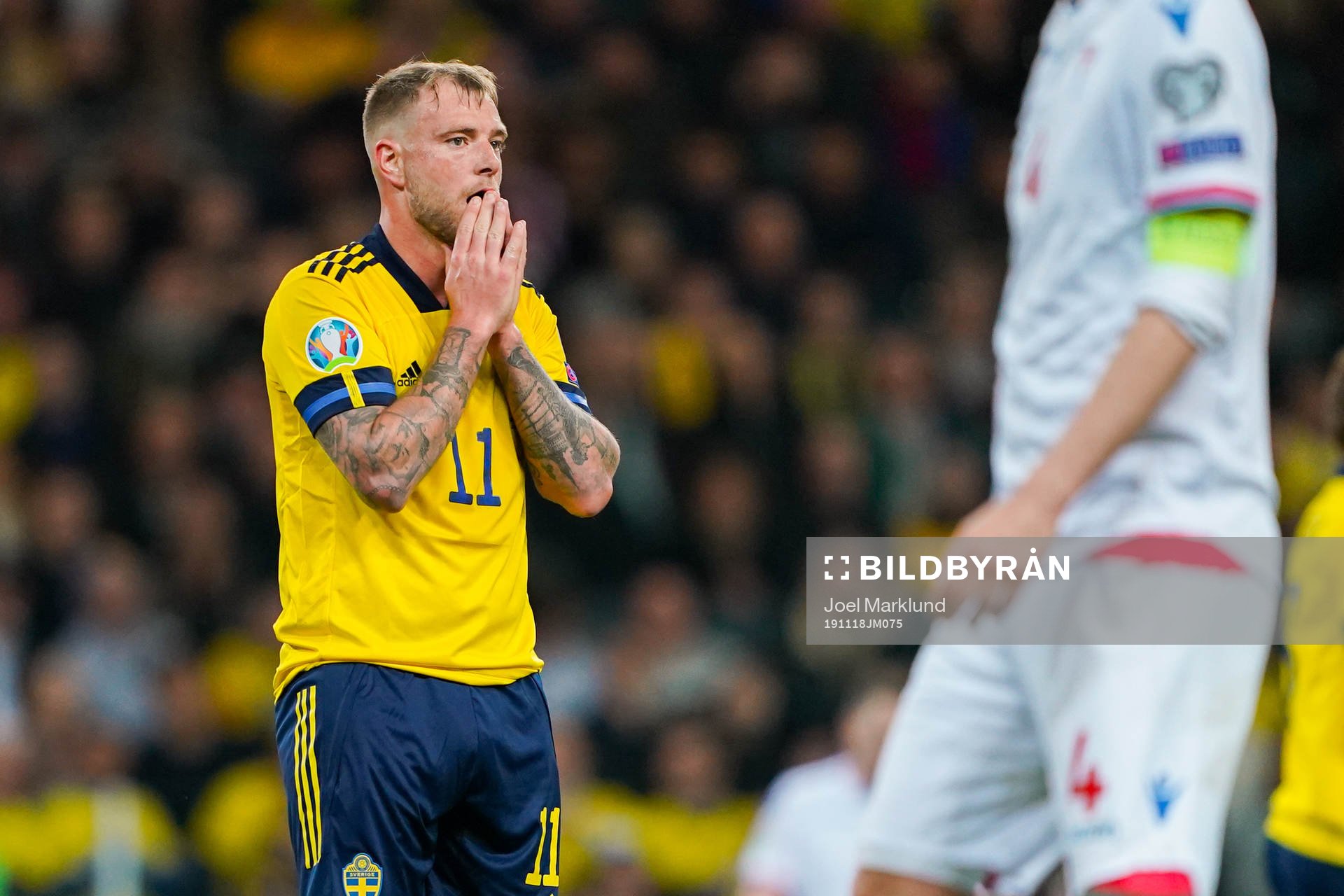 John Guidetti of Sweden looks dejected