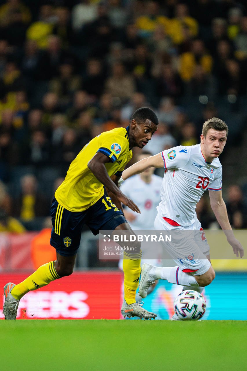 Alexander Isak of Sweden and Joannes Bjartalid of Faroe Islands during the UEFA Euro Qualifier football match between Sweden and Faroe Islands on November 18, 2019 in Stockholm.