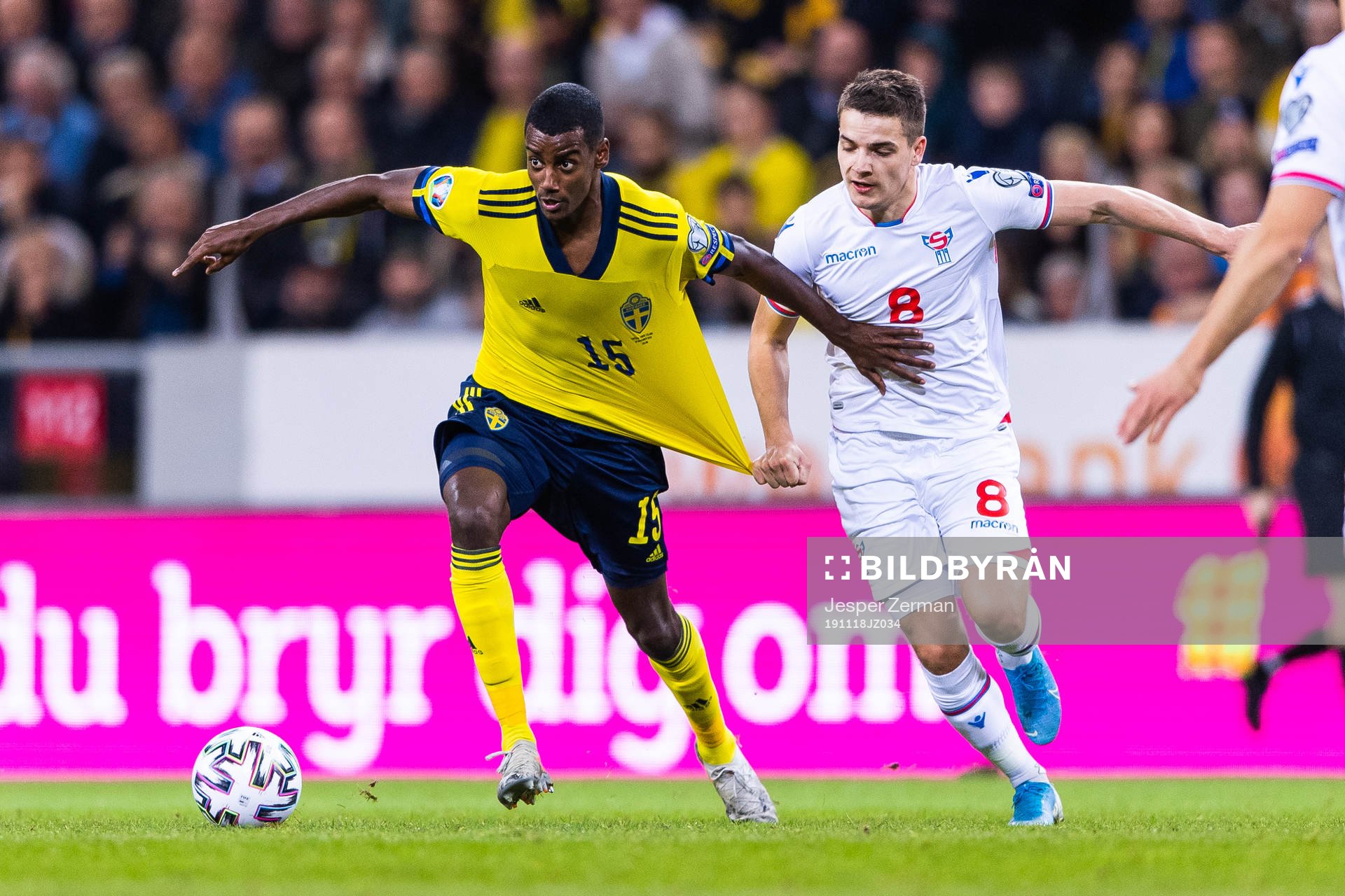 Alexander Isak of Sweden and Brandur Hendriksson Olsen of