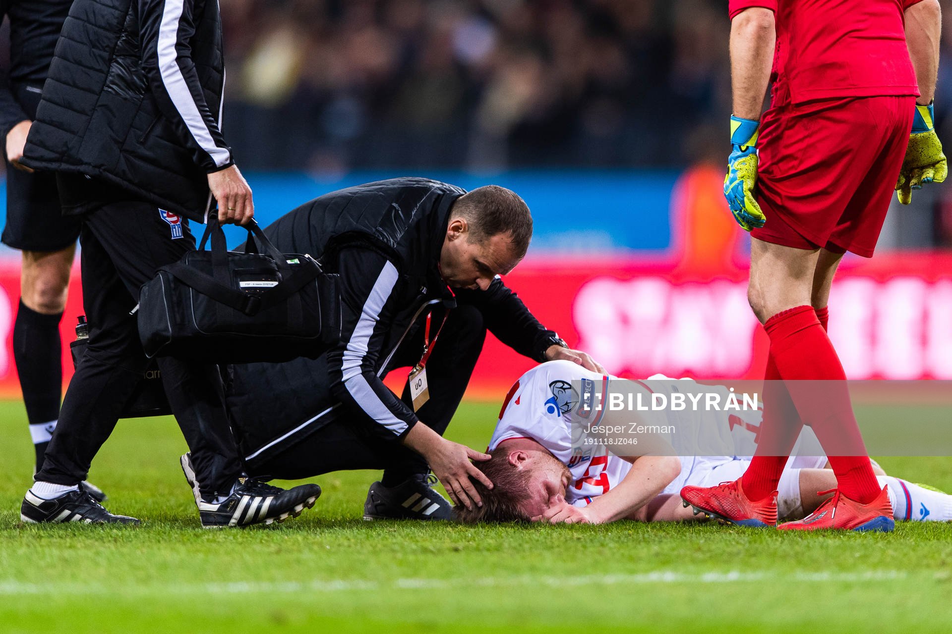 Medical staff attend to Klaemint Olsen of Faroe Islands due