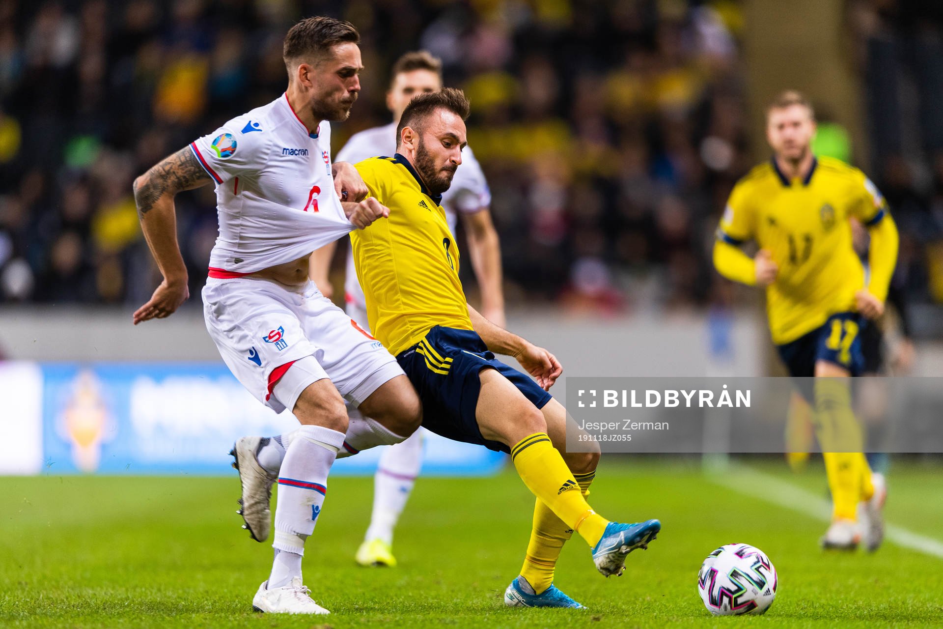 Heini Vatnsdal of Faroe Islands and Muamer Tankovic of